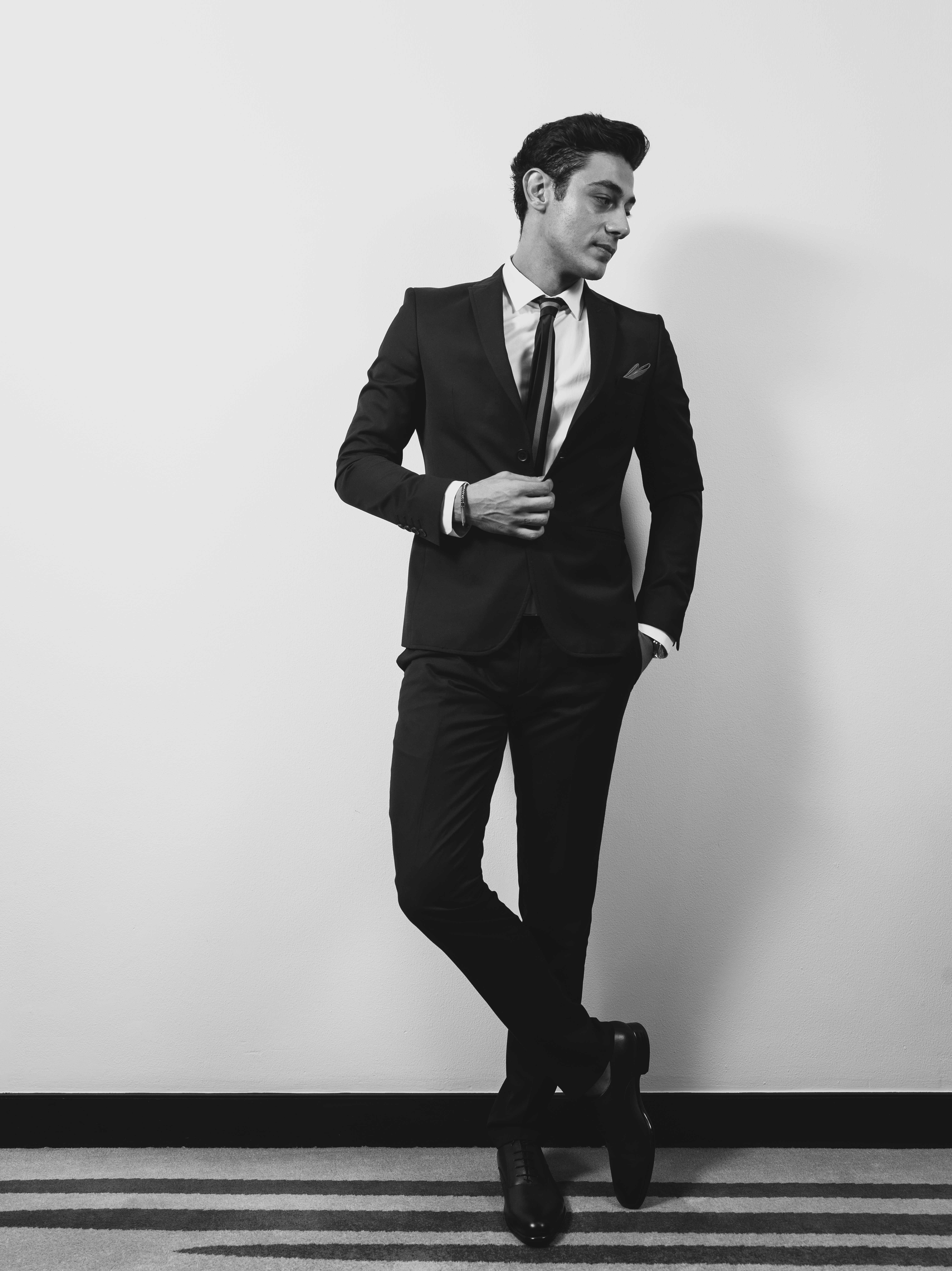 Man Wearing Suit Jacket, Dress Shirt, and Dress Pants Standing Near Wall · Free