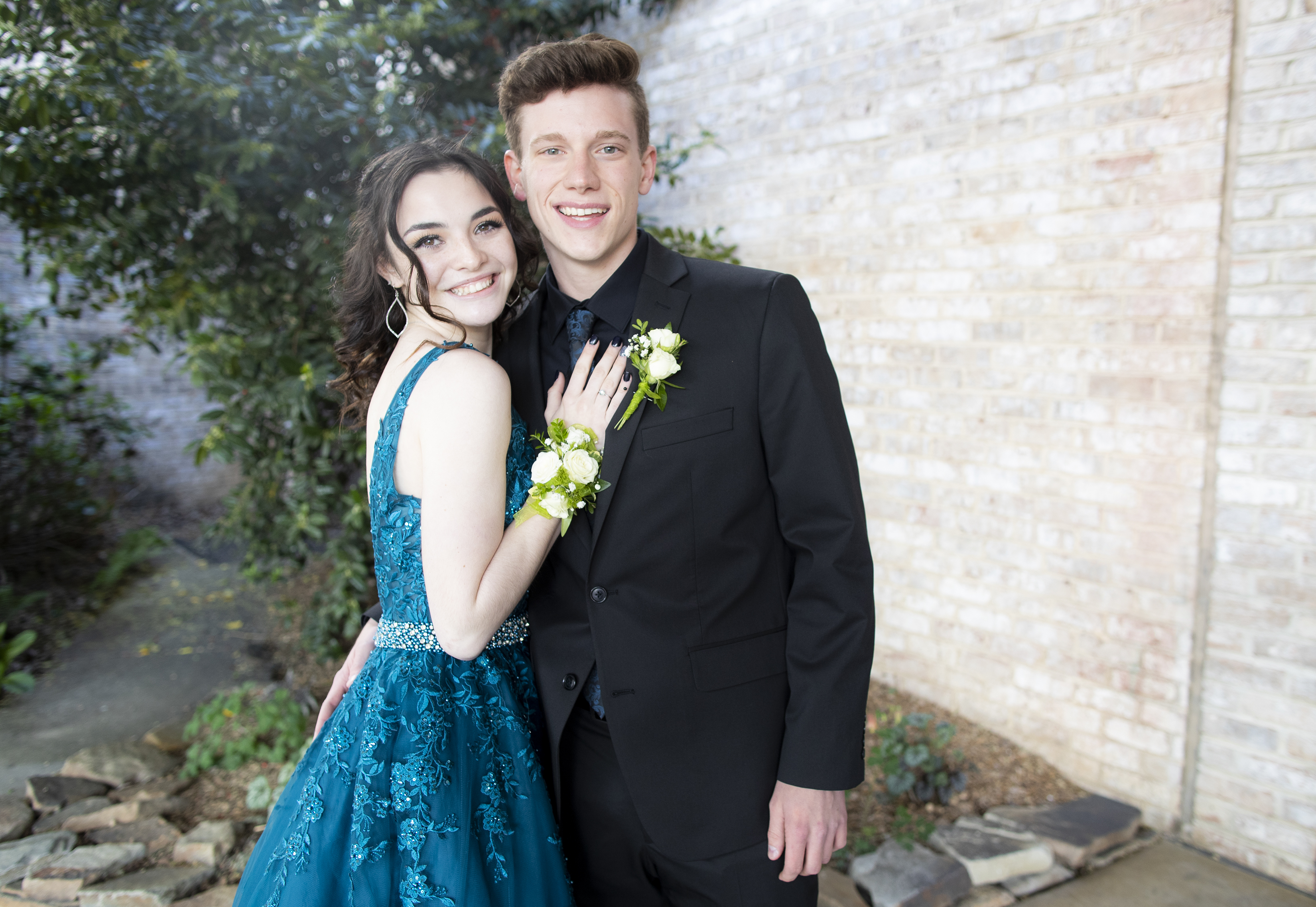 A Happy Interracial Couple Poses For A Portrait Before An Adult Prom. She  Is Wearing A Corsage. Stock Photo, Picture and Royalty Free Image. Image  63903880.