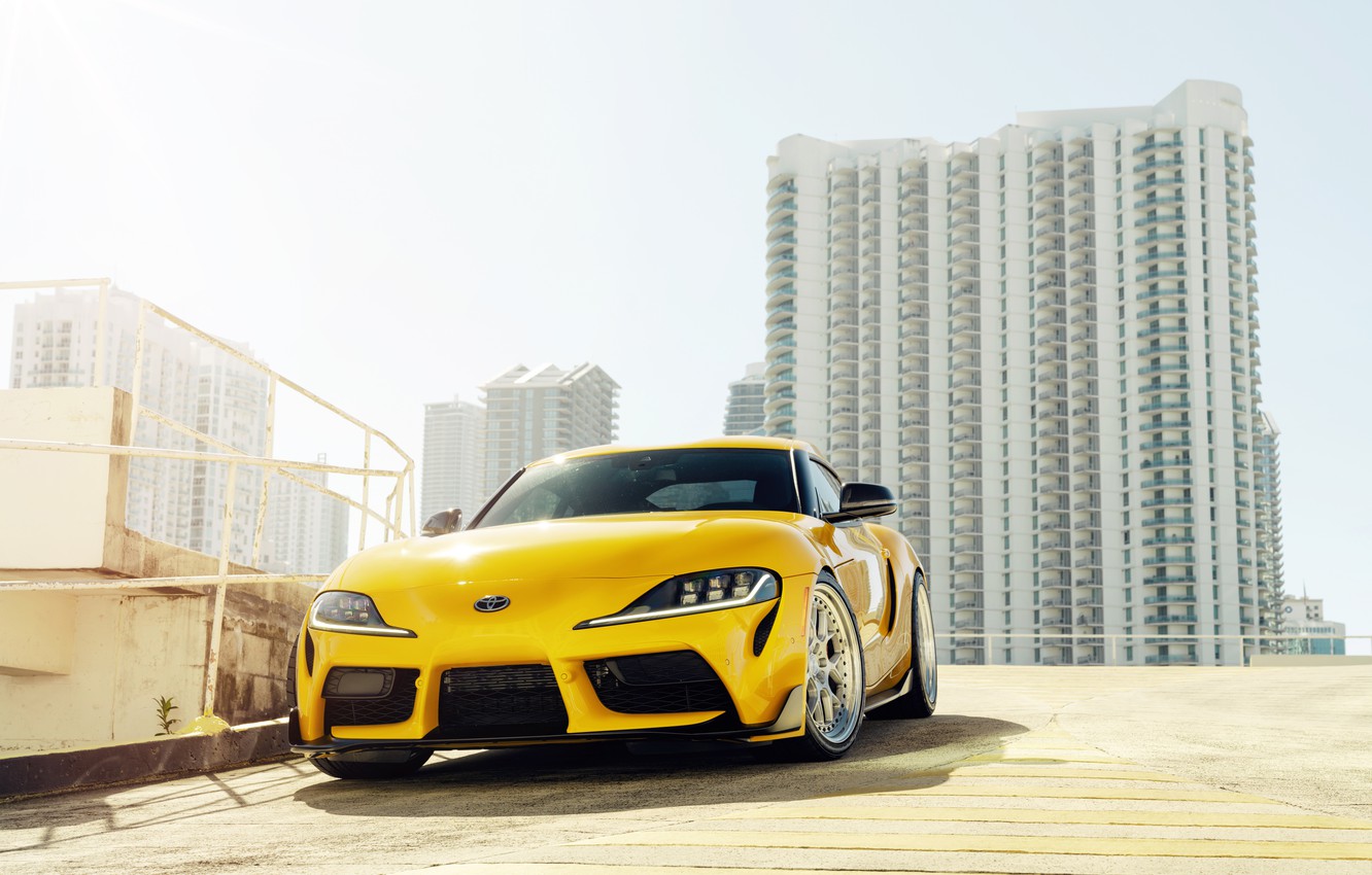 Wallpaper yellow, building, sports car, front view, Toyota Supra, 2020 Toyota GR Above image for desktop, section toyota