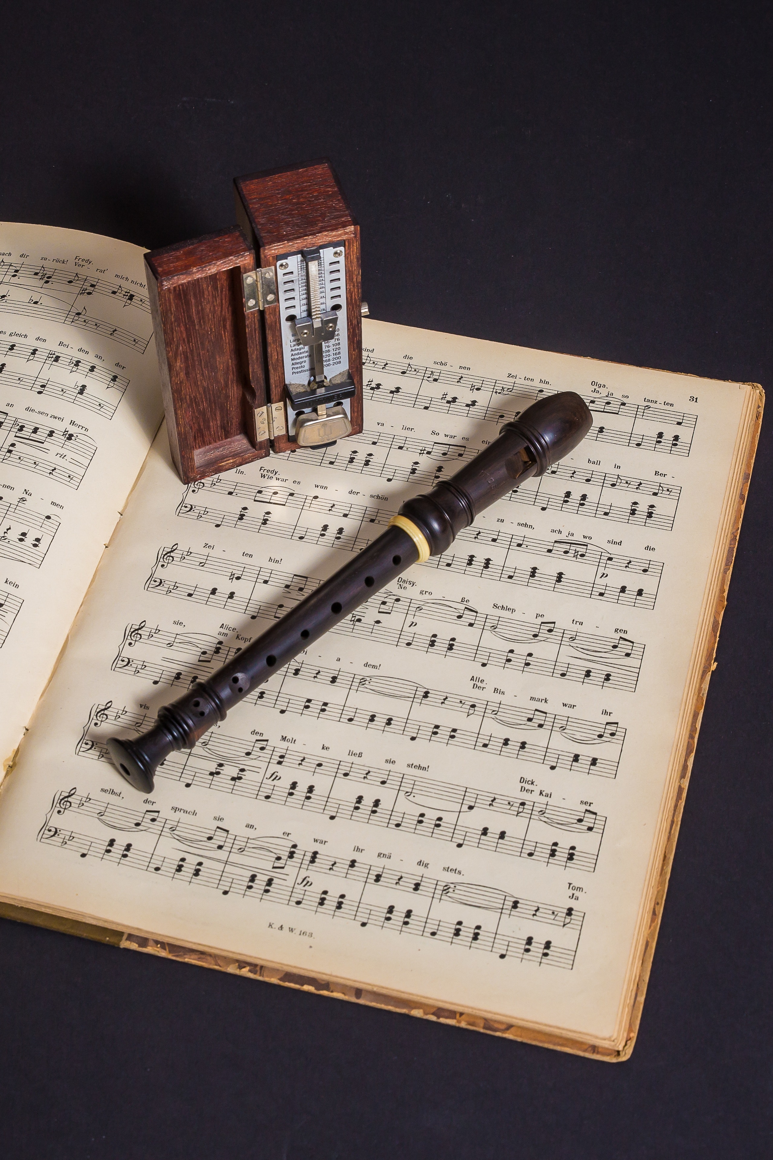 Brown Wooden Flute on Book With Notes · Free
