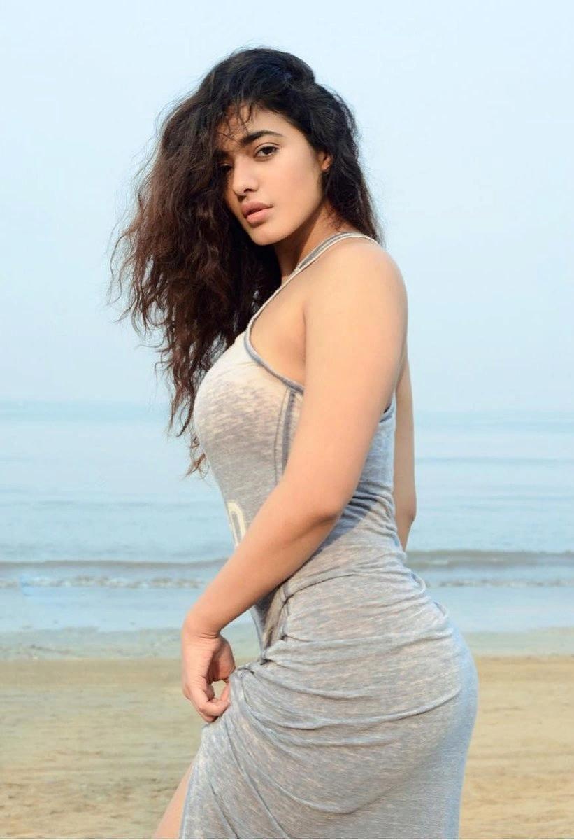 Who is Malvika Sharma, and what are some stunning photo of her?