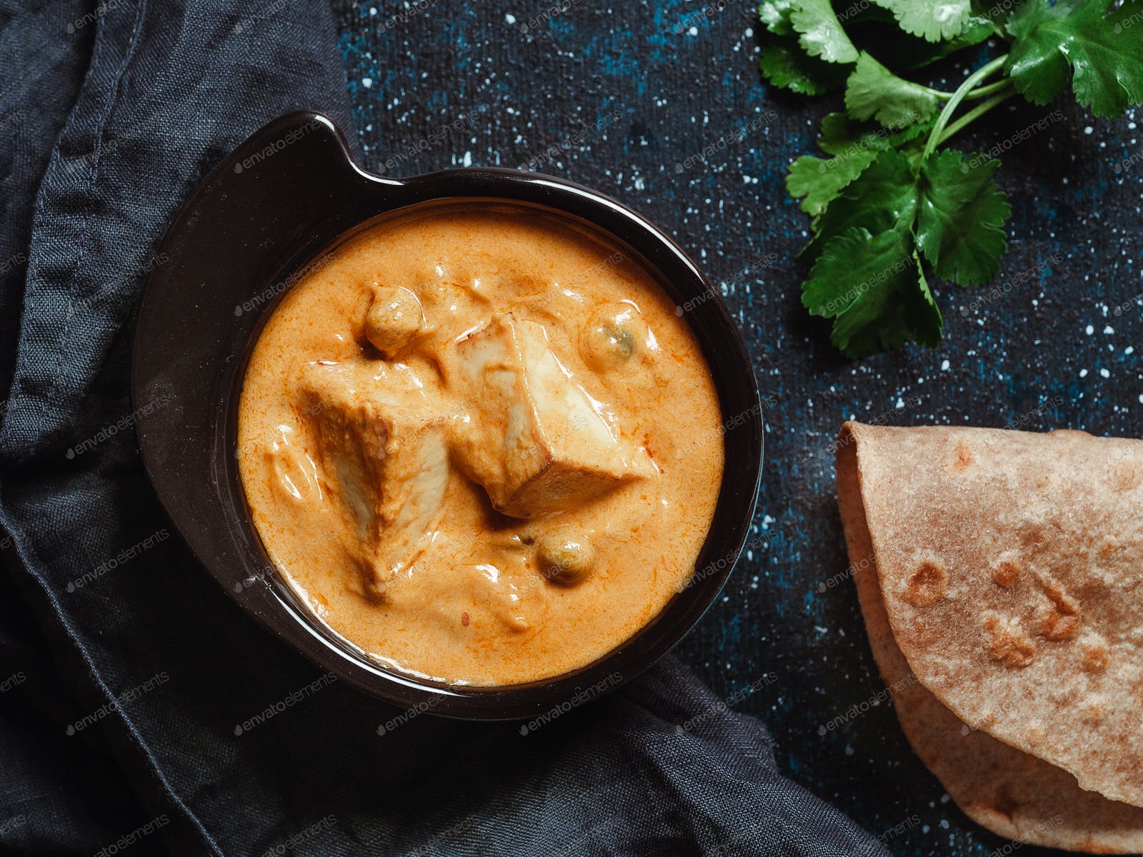Shahi paneer or paneer butter masala, top view photo by Fasci on Envato Elements