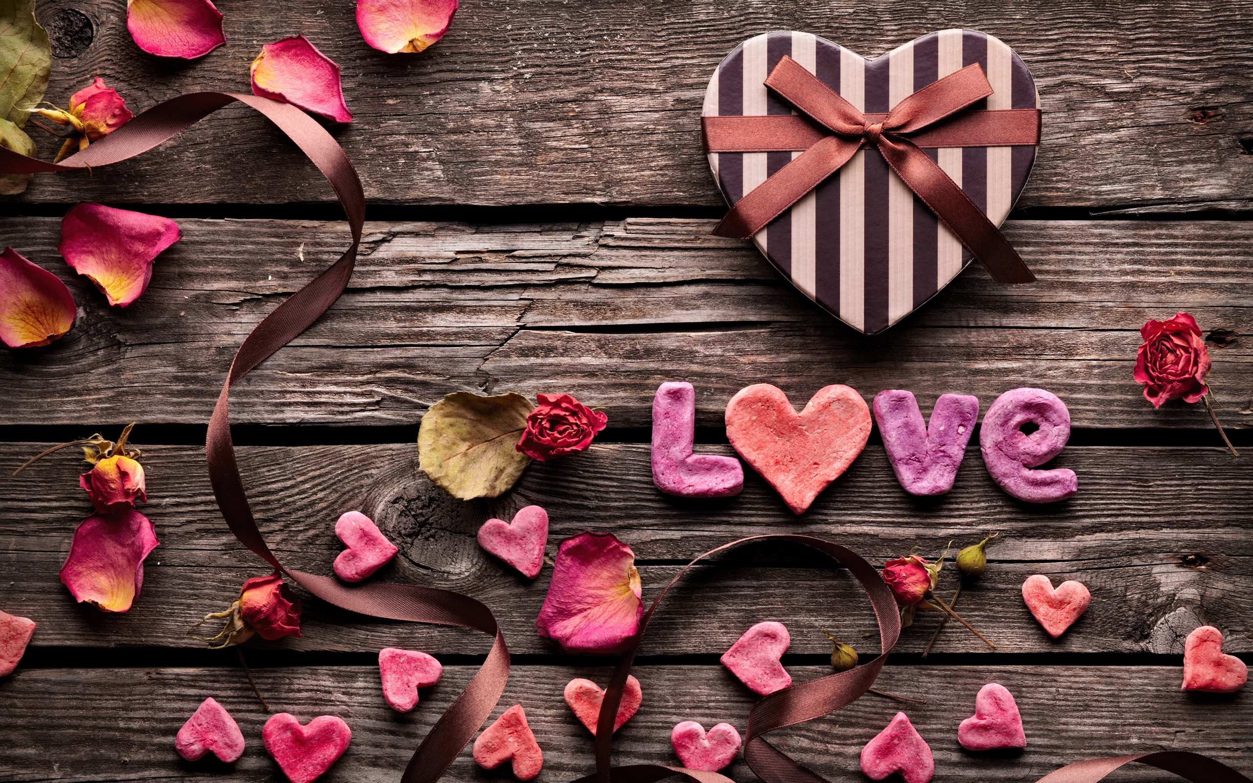 Download 2560x1600 Valentine's Day, Love, Wood, Heart, Leaves, Petals, Romance Wallpaper for MacBook Pro 13 inch