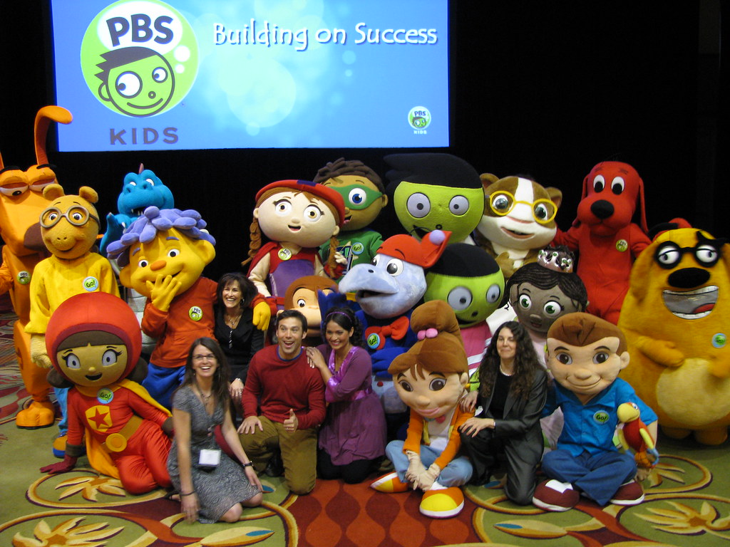 PBS KIDS Family. A family photo with PBS KIDS characters, L