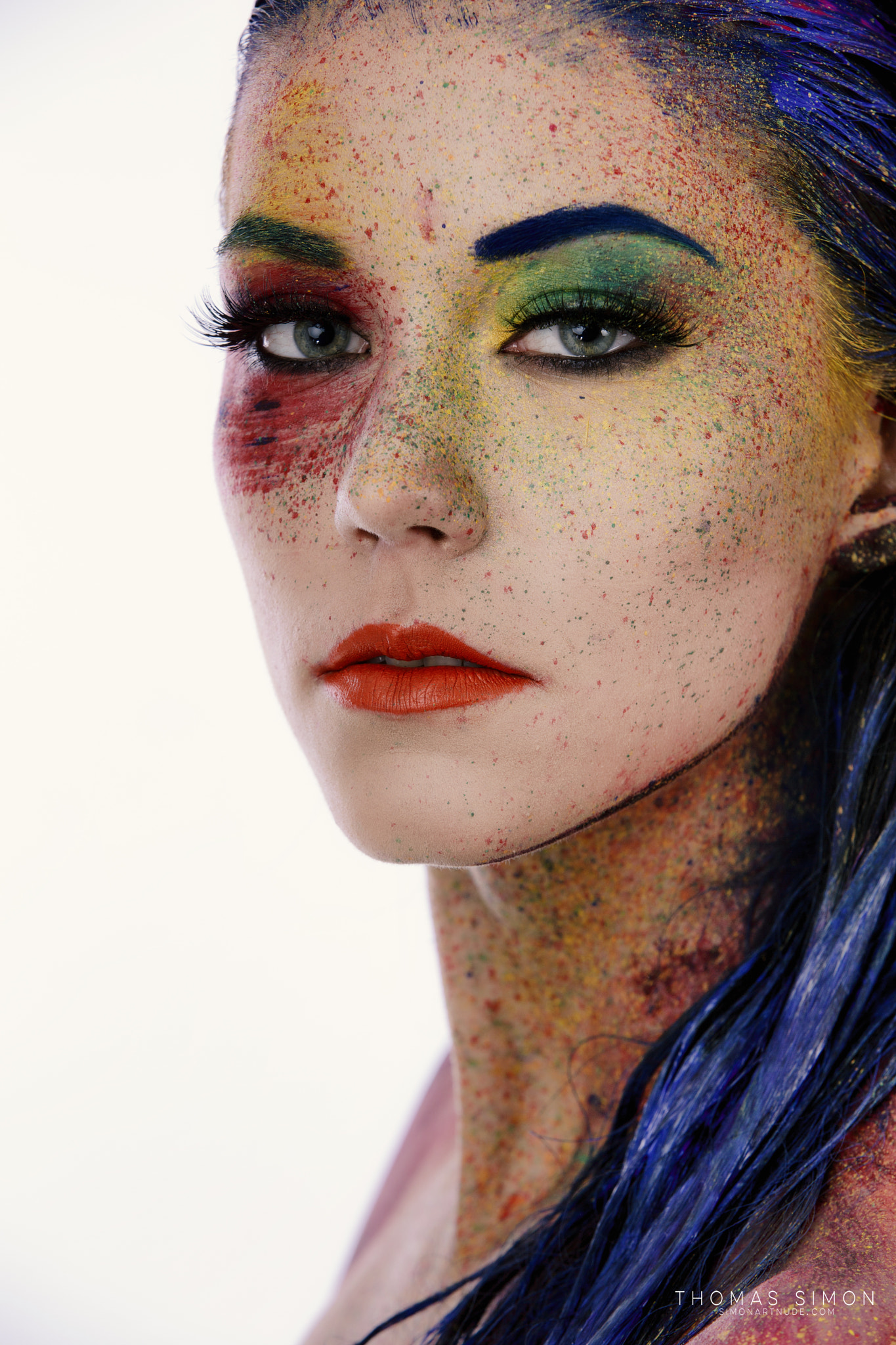 Wallpaper, Thomas Simon, women, blue hair, looking at viewer, body paint, face paint, colorful, makeup, lipstick, splatter, portrait, glamour, simple background, white background, eyeliner, red, green, yellow 1365x2048