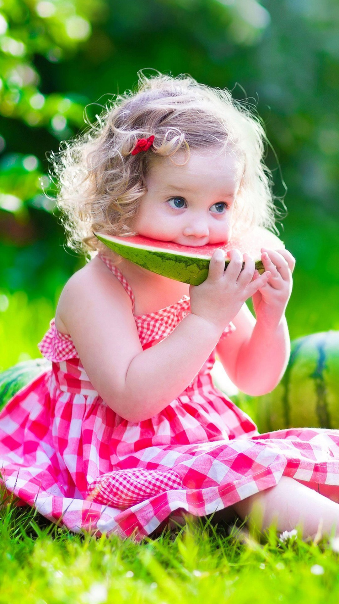 Cute Baby Girl Is Sitting On Green Grass Eating Watermelon Wearing Pink Dress 4K HD Cute Wallpaper