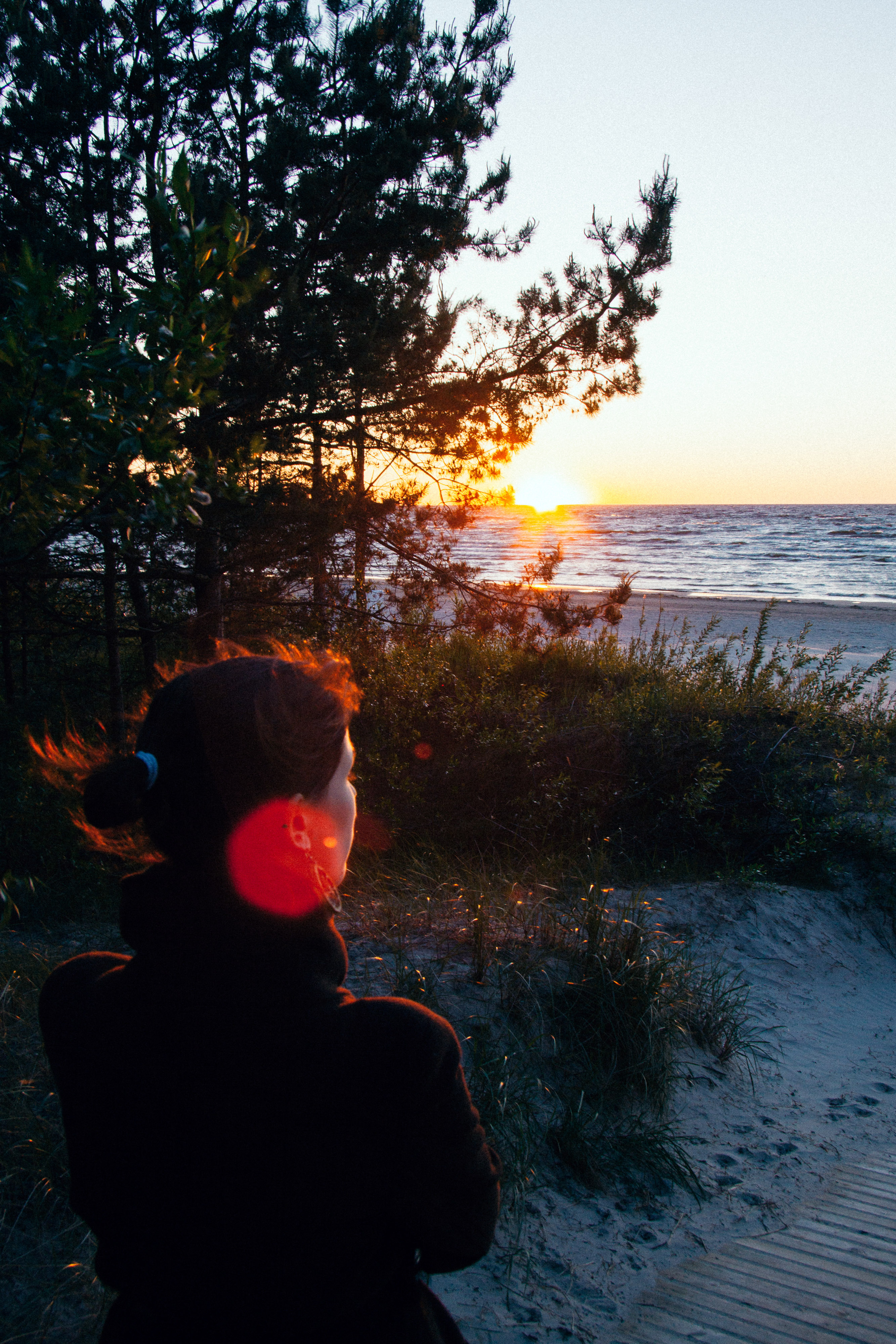 Girl watching the sunset