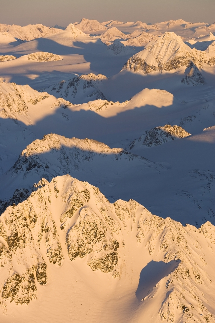 Peaks Of A Snow Covered Mountain Range Glowing Pink At Sunset, Kachemak Bay State Park; Alaska, United States Of America Poster Print by Scott Dickerson / Design Pics # VARDPI12328798