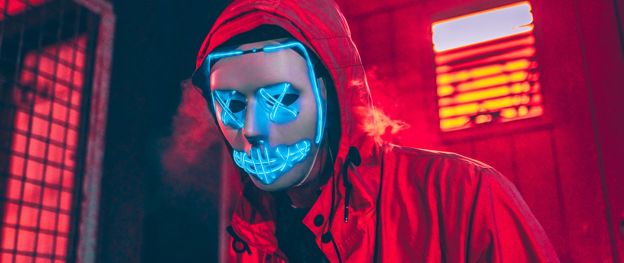 Download wallpaper 2560x1080 neon mask, mask, man, hood, red dual wide 1080p HD background