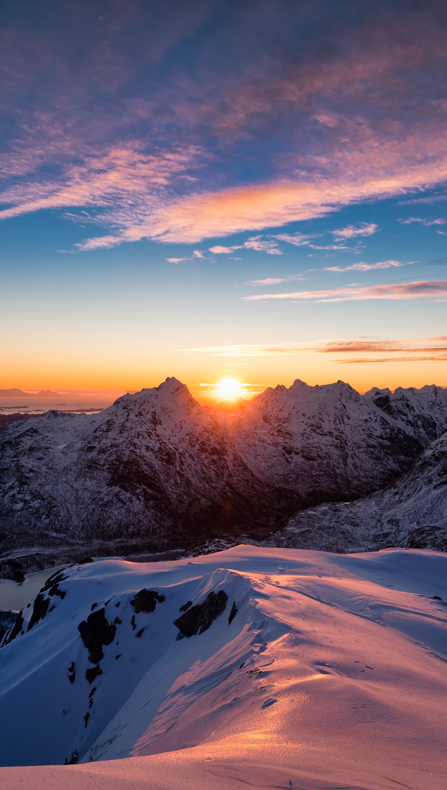 Sunset in snowy mountains Wallpaper 5k Ultra HD