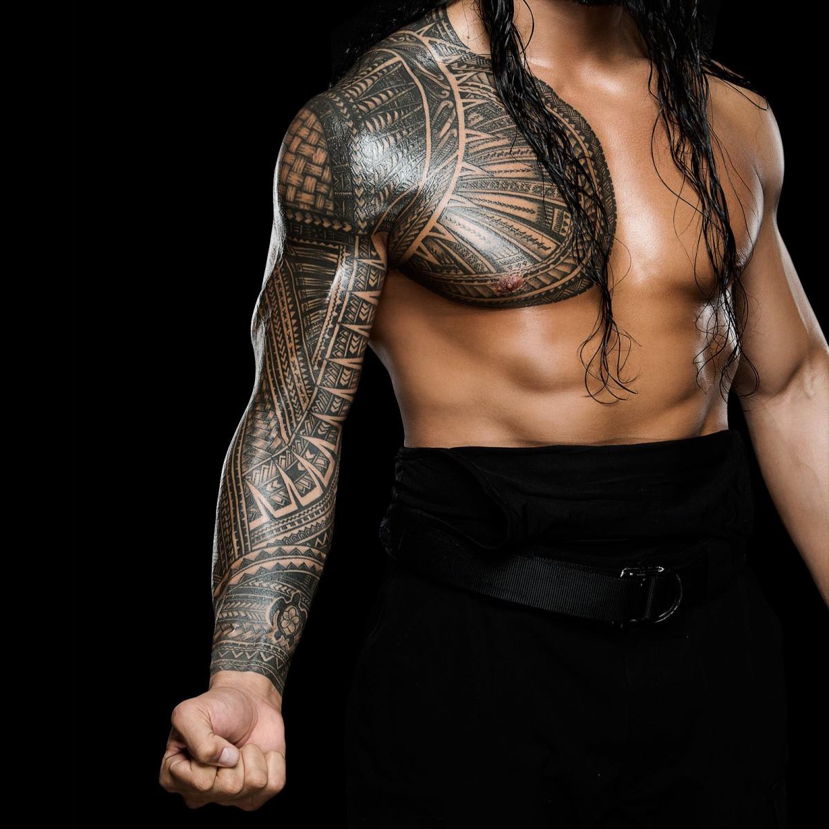 Who is Roman Reigns tattoo artist