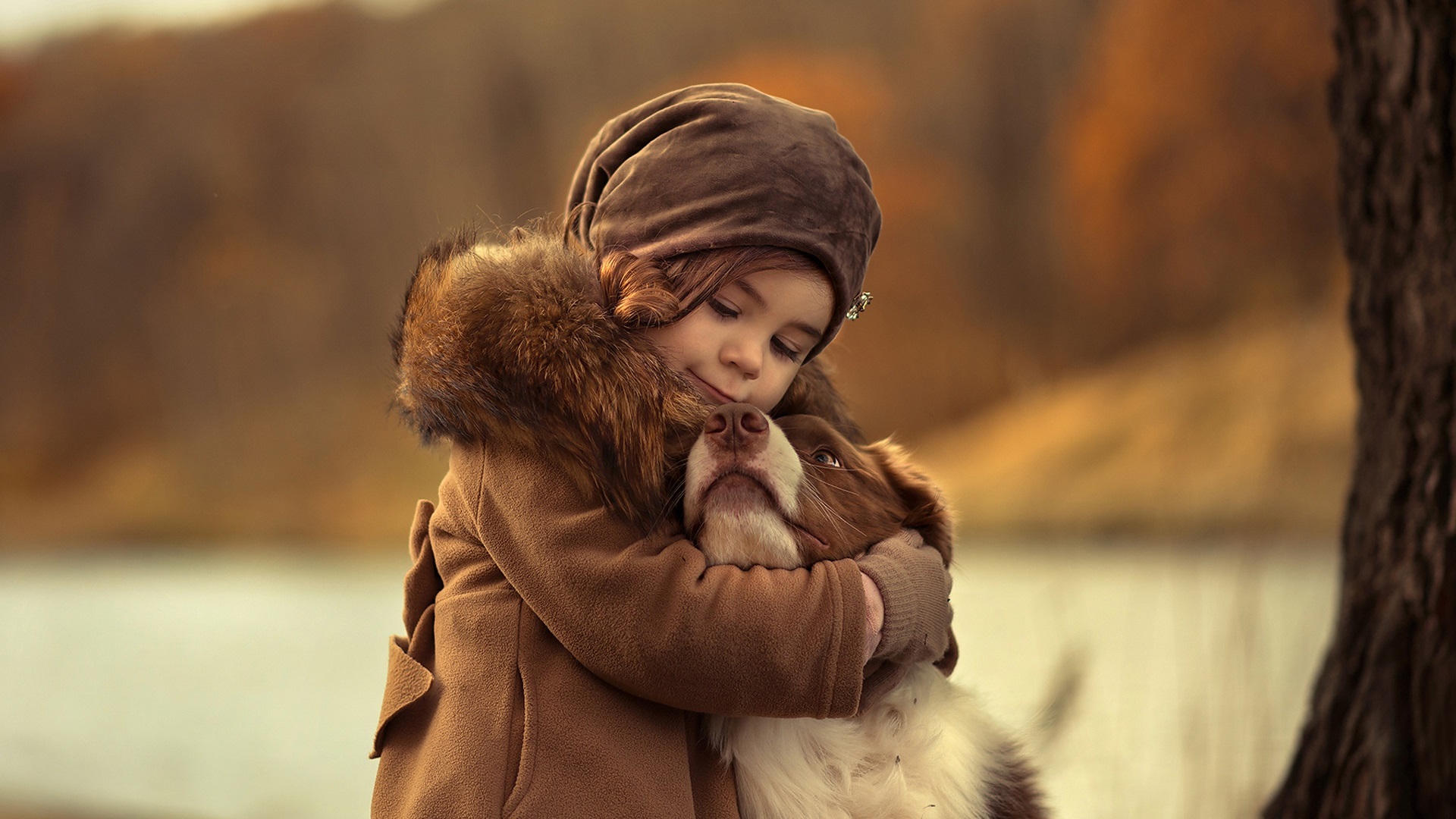 Wallpaper Cute child girl hug a dog 1920x1200 HD Picture, Image