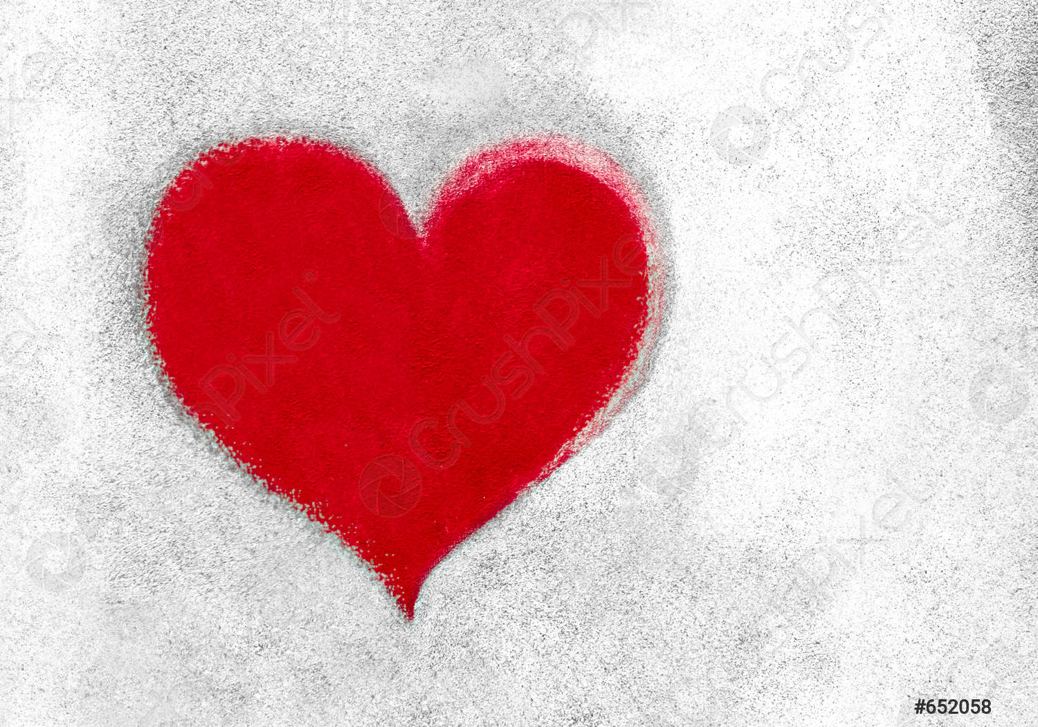 Red heart on concrete wall