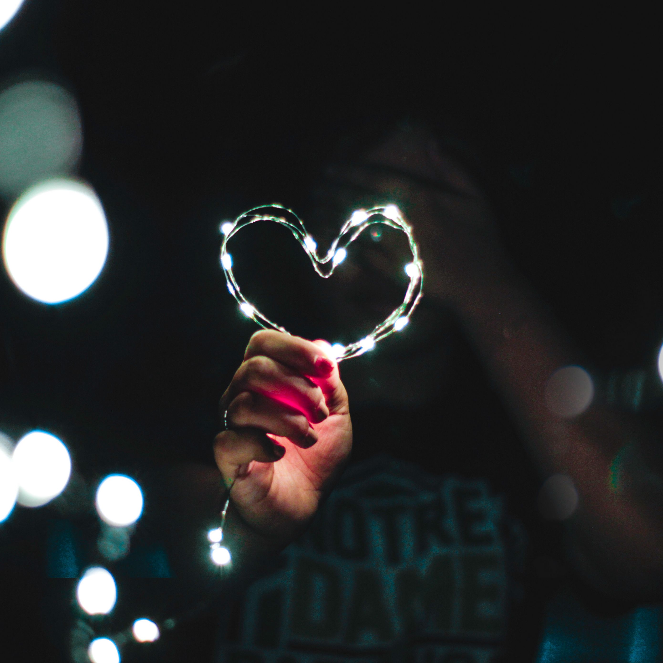 Download wallpaper 2780x2780 heart, hand, light, glitter, glare ipad air, ipad air 2, ipad 3, ipad 4, ipad mini 2, ipad mini 3, ipad mini 4, ipad pro 9.7 for parallax HD background