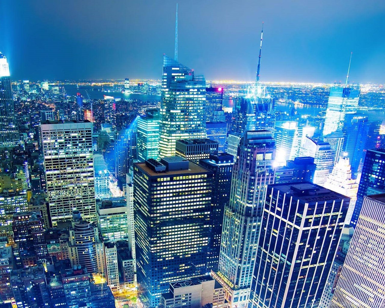 Bright Rockefeller Center Of New York City At Night Desktop Background
