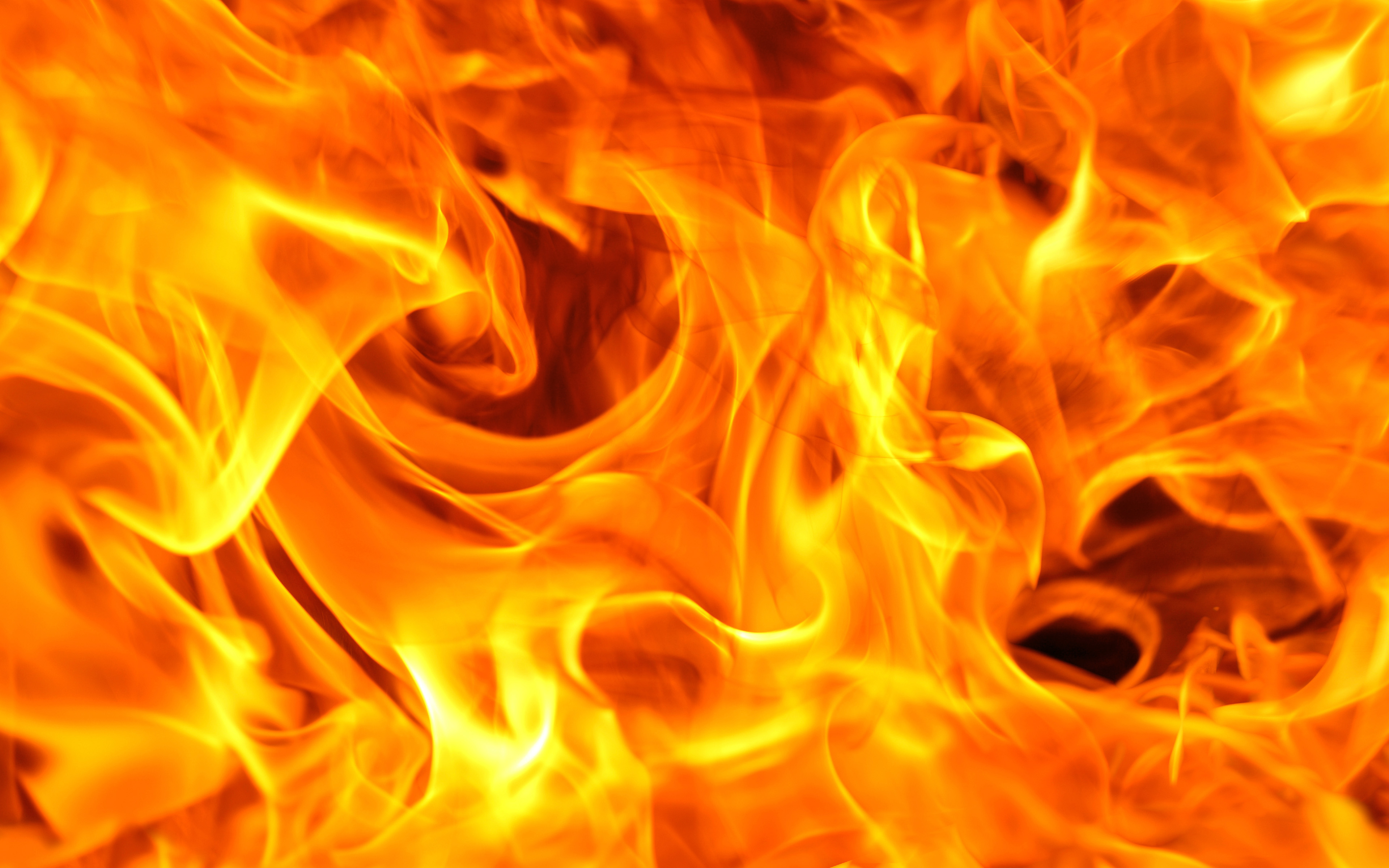 Download wallpaper 4k, orange flames, bonfire, fire flames, macro, orange fire texture, orange fire background for desktop with resolution 3840x2400. High Quality HD picture wallpaper