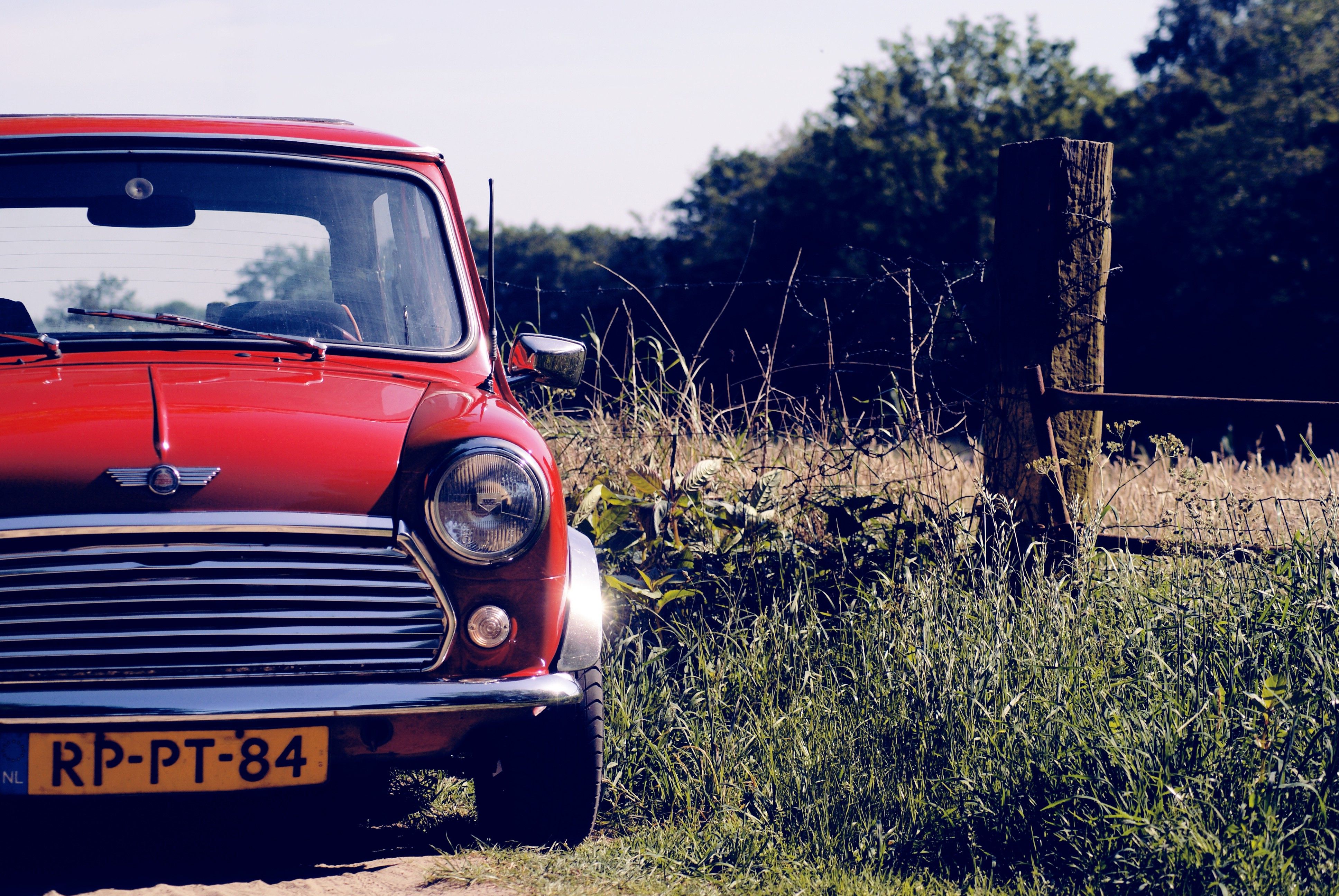 A beautiful Old classic red Mini Cooper in the country. Mini cooper wallpaper, Mini cooper, HD wallpaper