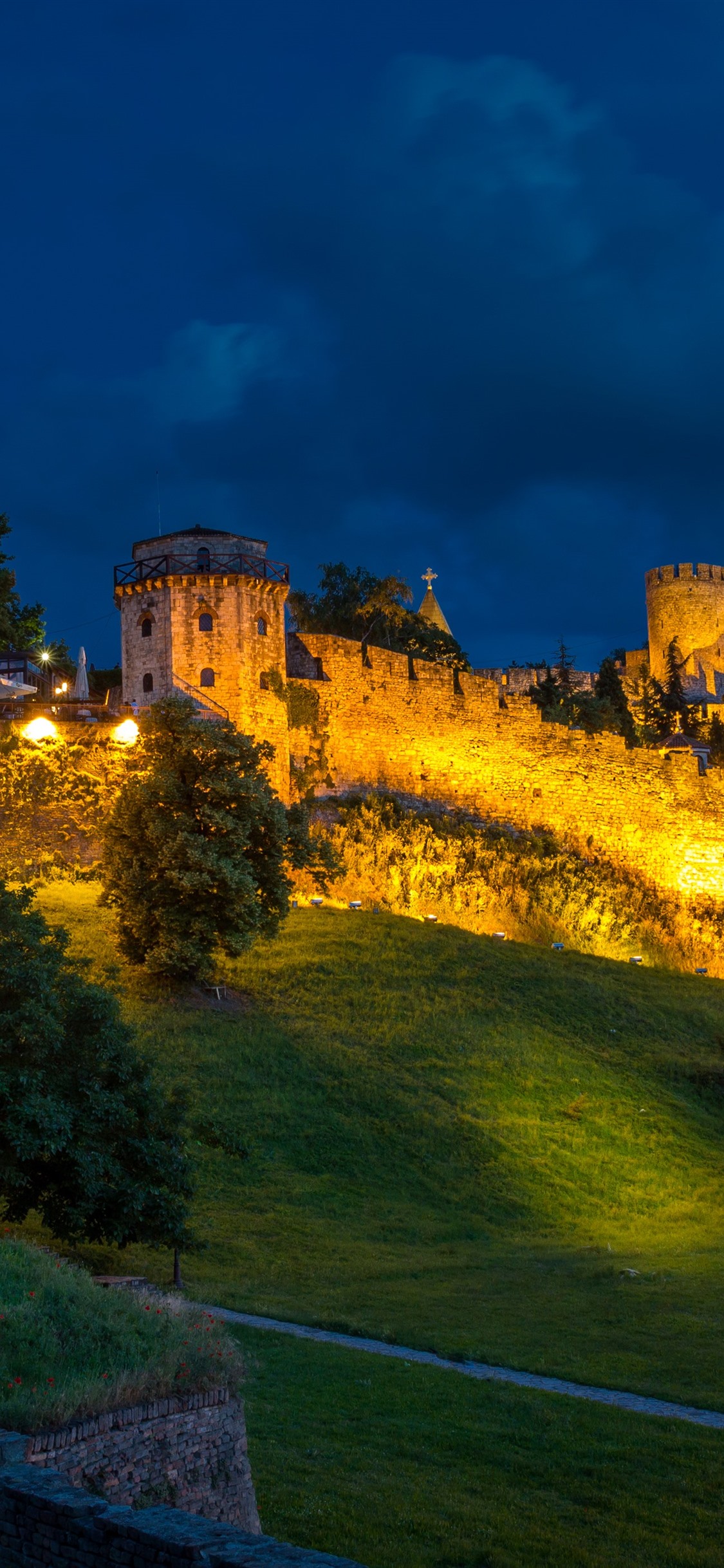 Serbia, Belgrade Fortress, Slope, Trees, Lights, Night 1242x2688 IPhone 11 Pro XS Max Wallpaper, Background, Picture, Image