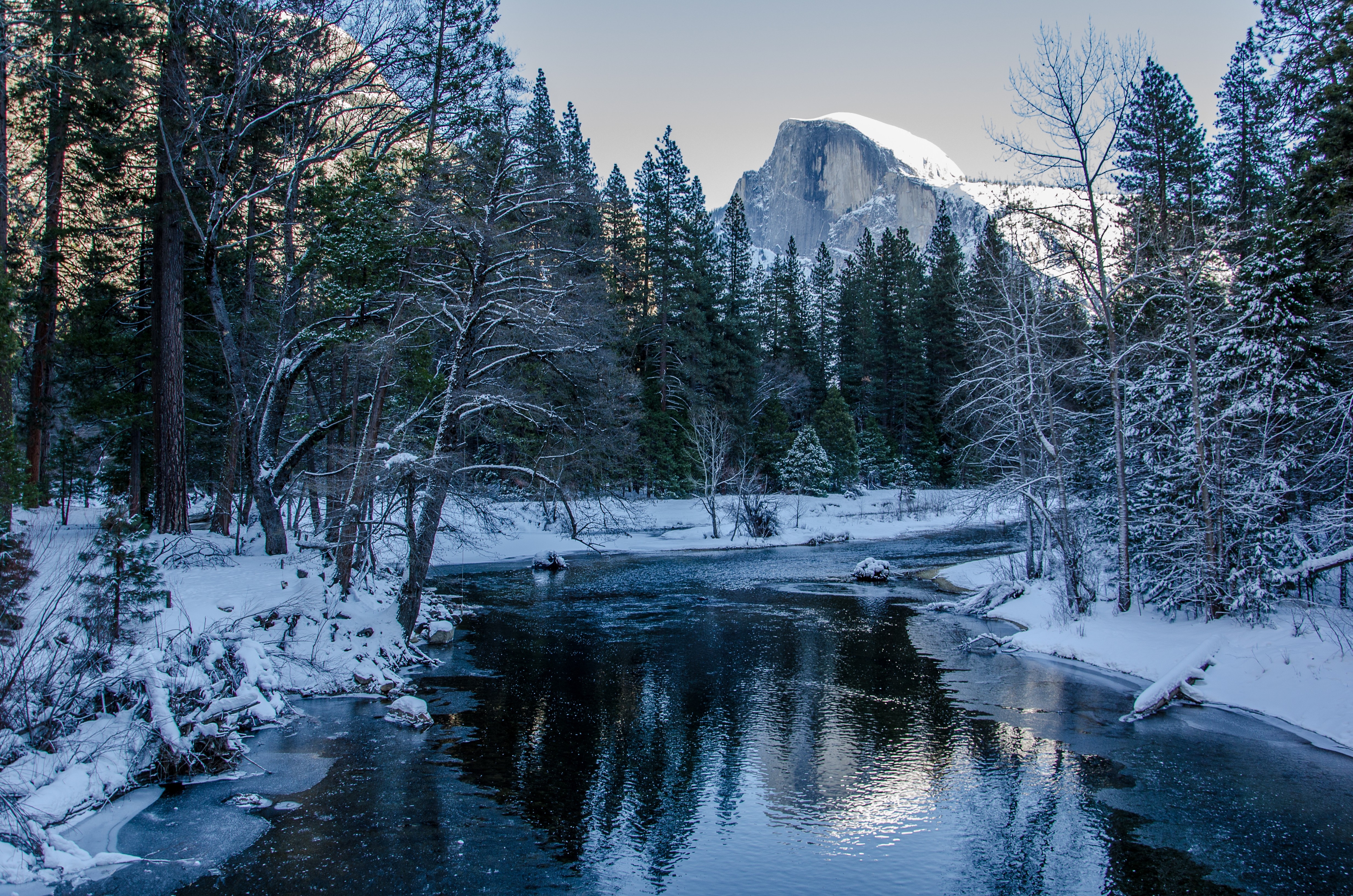 Winter Serenity: Snow Covered Forest River In Stunning 4K Ultra HD