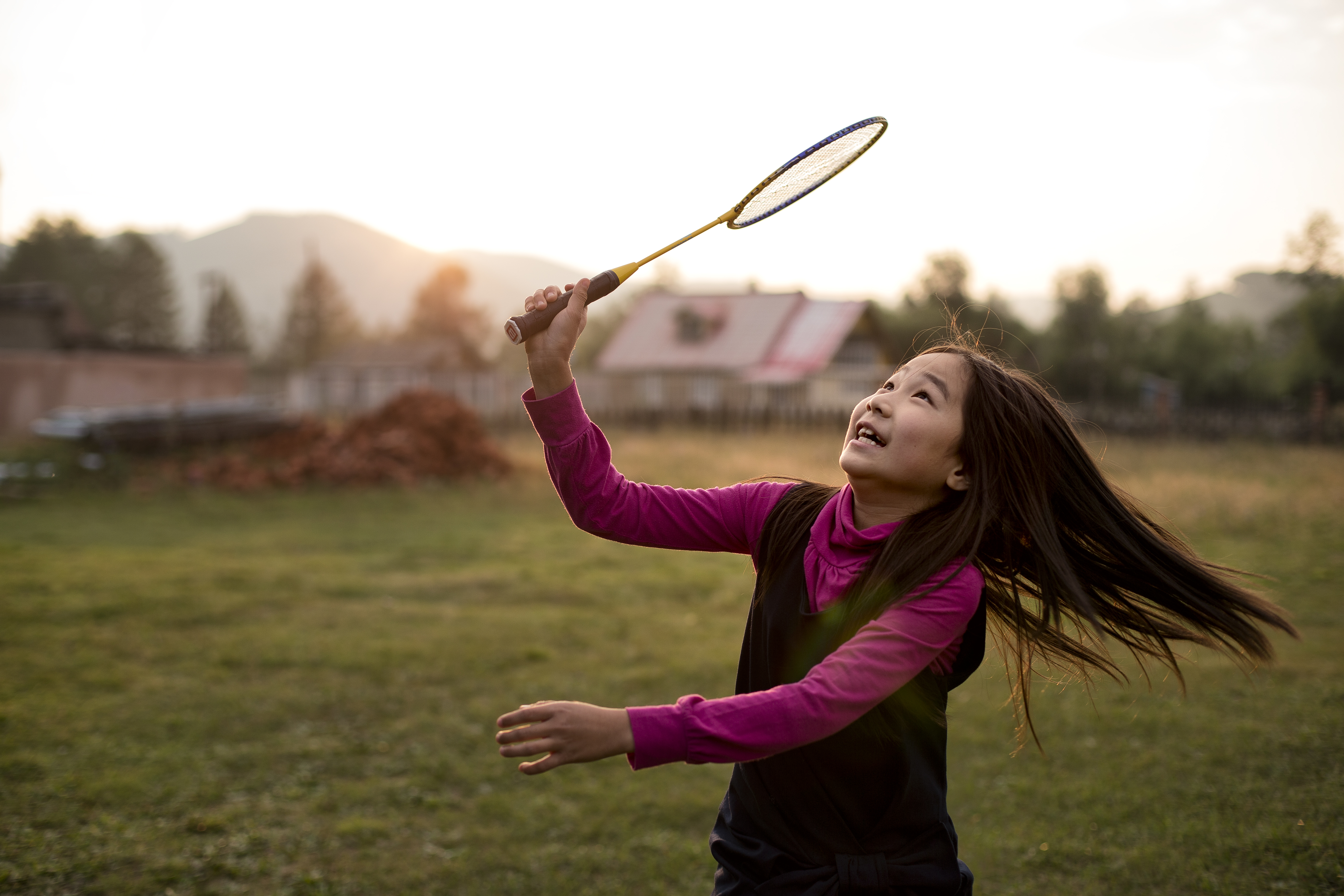 Girl Plays Badminton