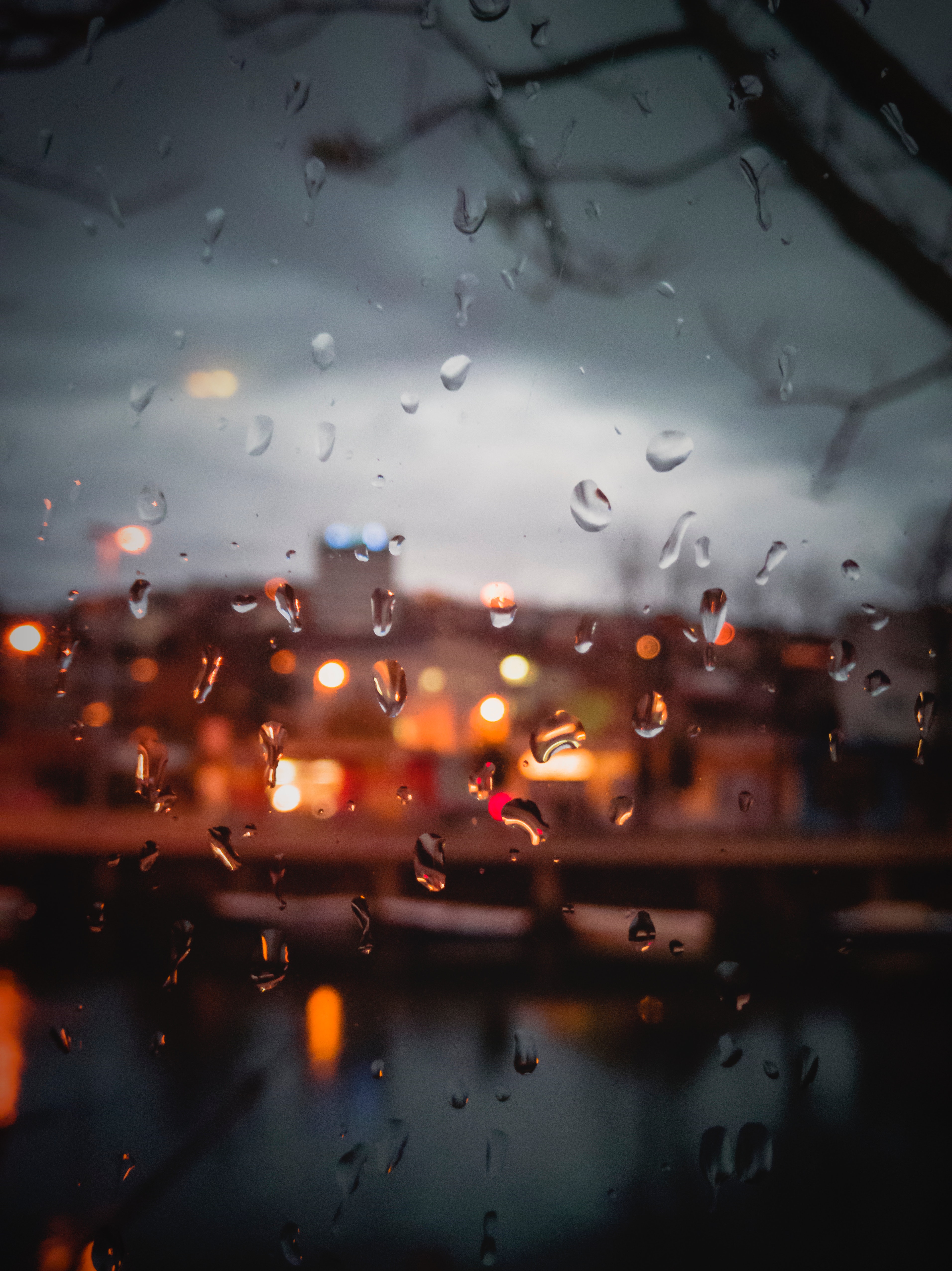 Download wallpaper 3824x5104 drops, rain, glass, moisture, window, blur HD background