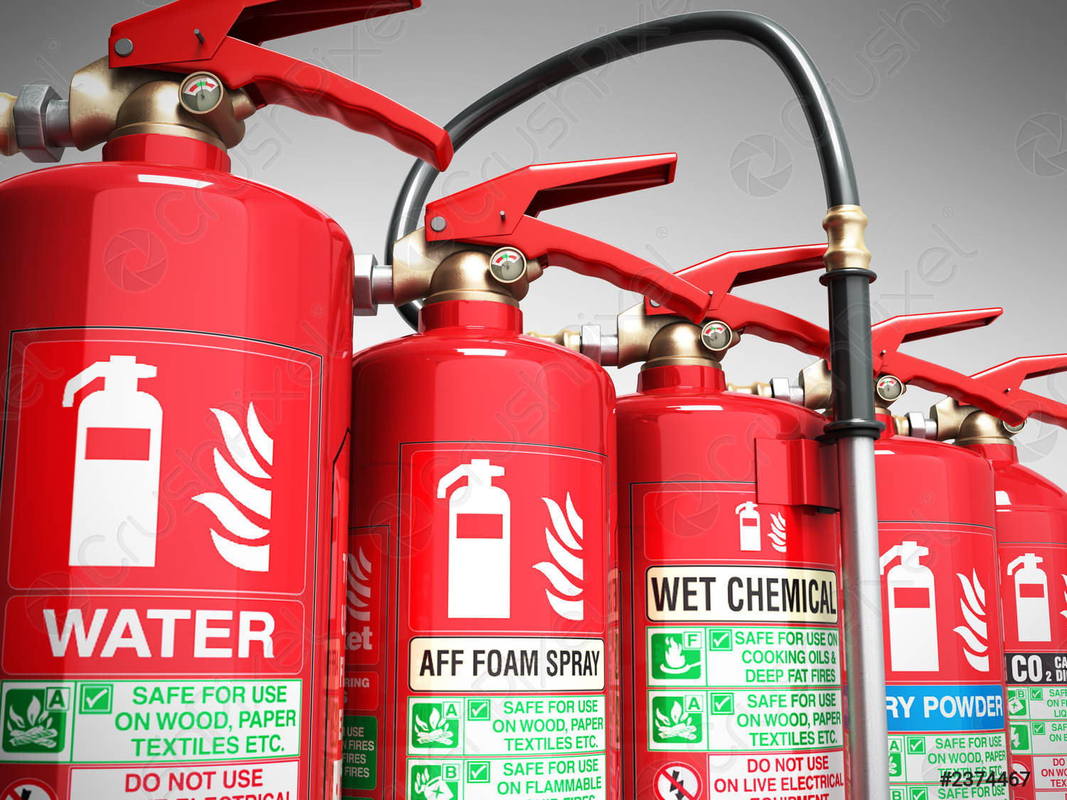 Fire extinguishers isolated on grey background Various types of extinguishers