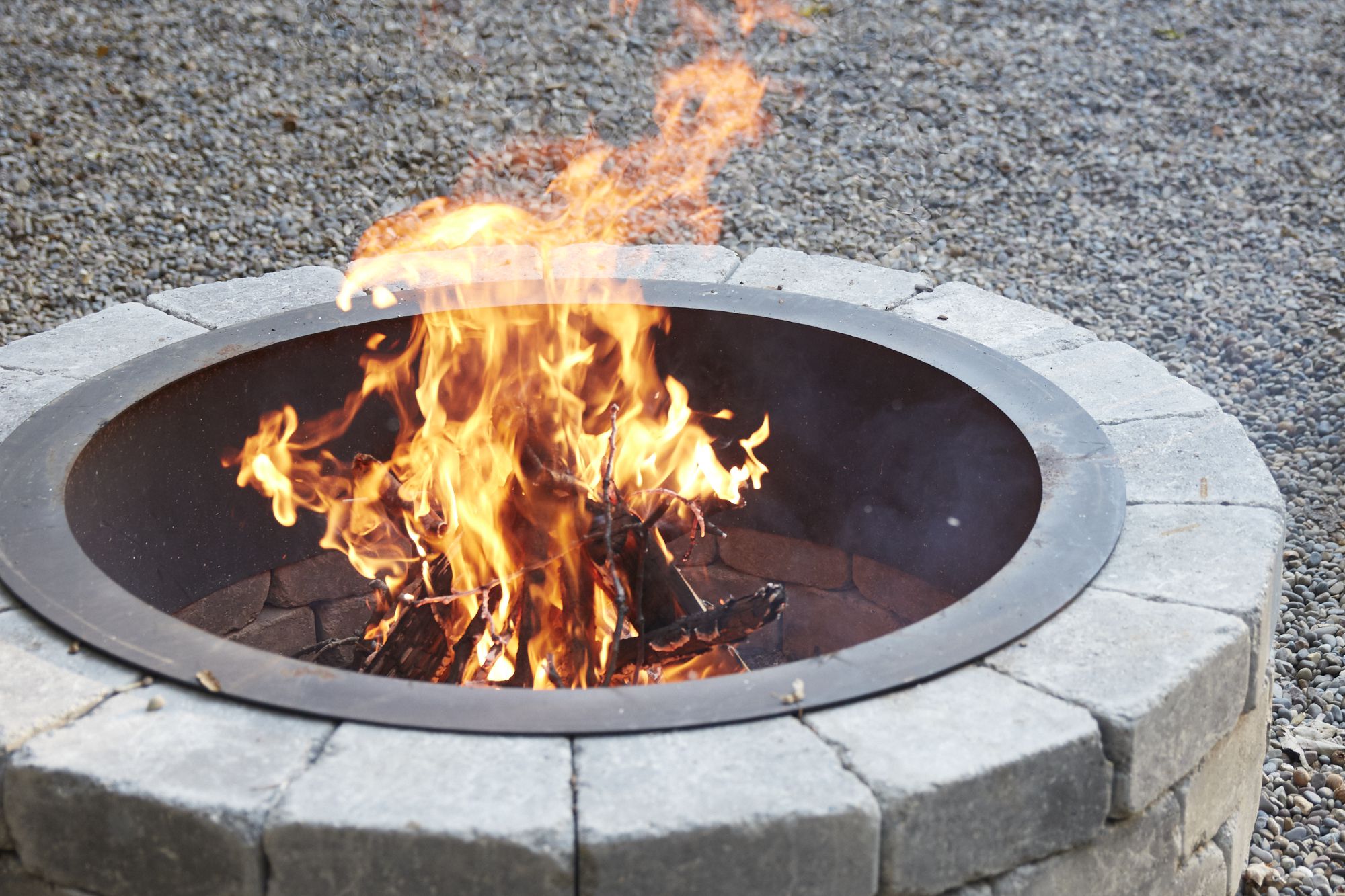 Stone Fire Pits to Spark Ideas for Your Outdoor Space