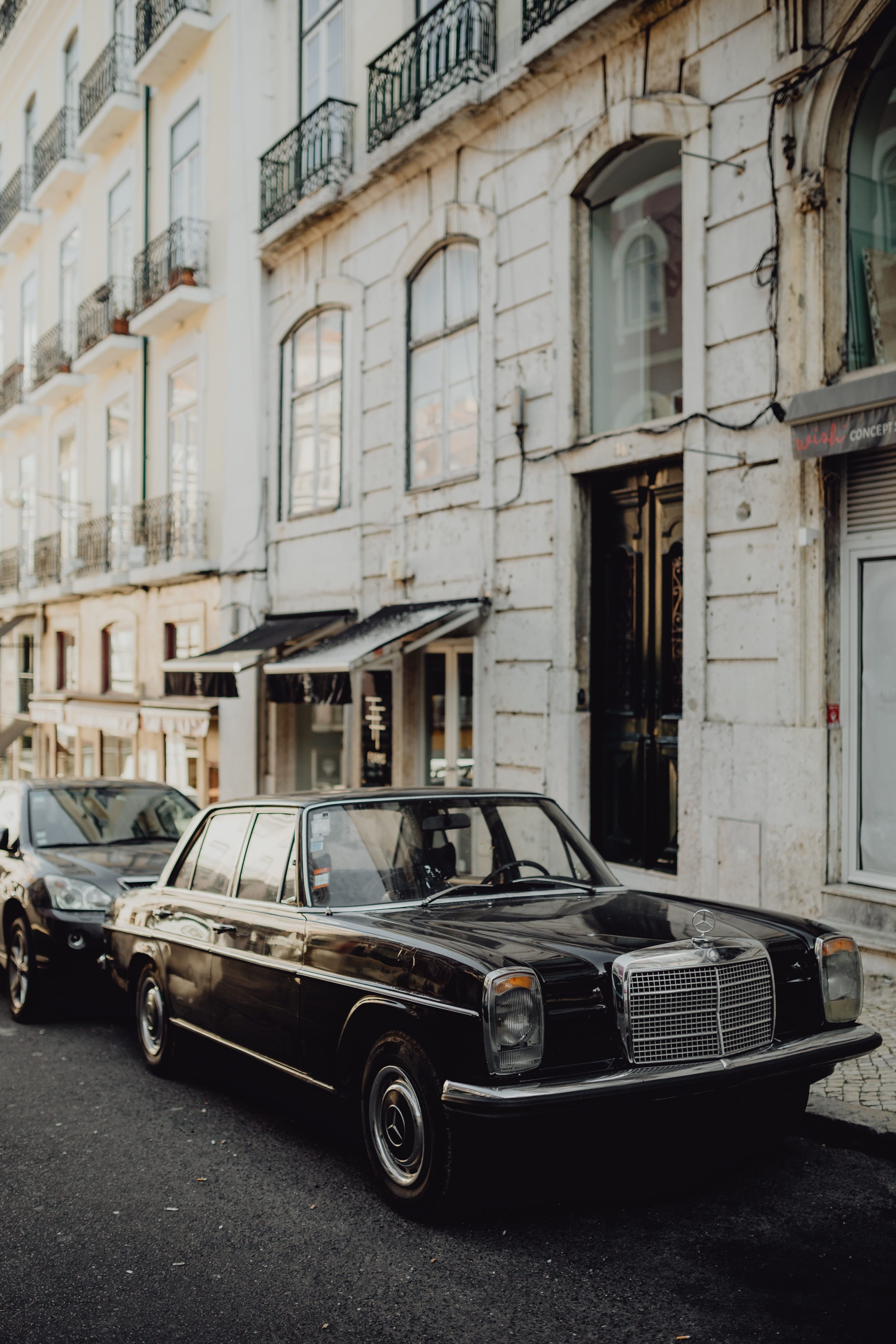 An old Mercedes Benz parked in the street, Lisbon, Portugal #vintage #car black car #black #auto #portugal. Old mercedes, Black car wallpaper, New car wallpaper