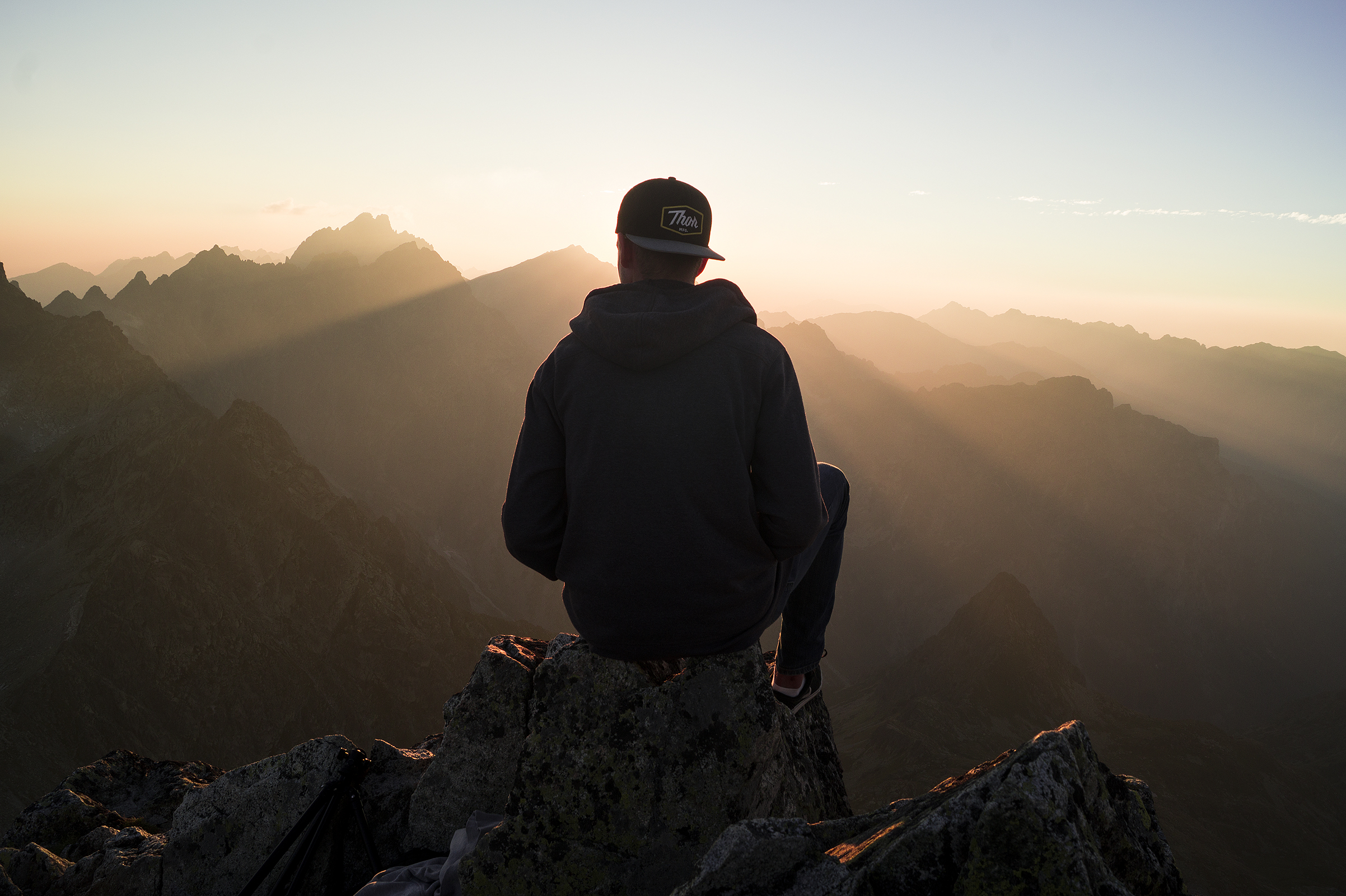Man Sitting on the Mountain Edge · Free