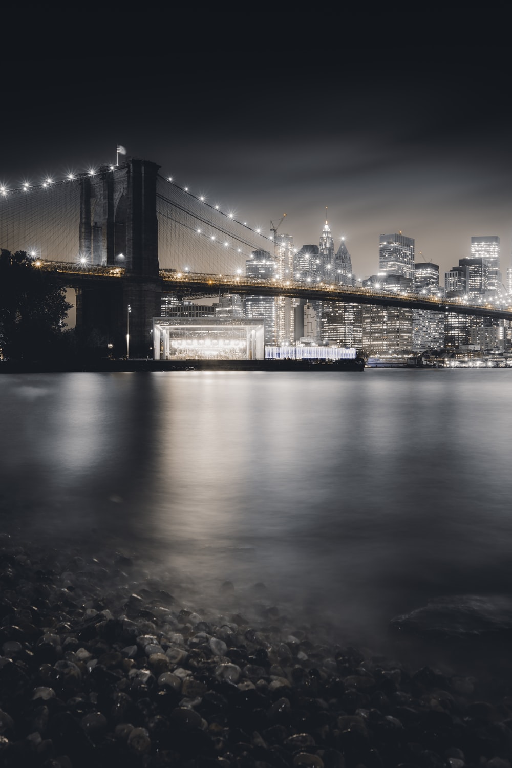 Brooklyn Bridge at nighttime in skyline photography photo