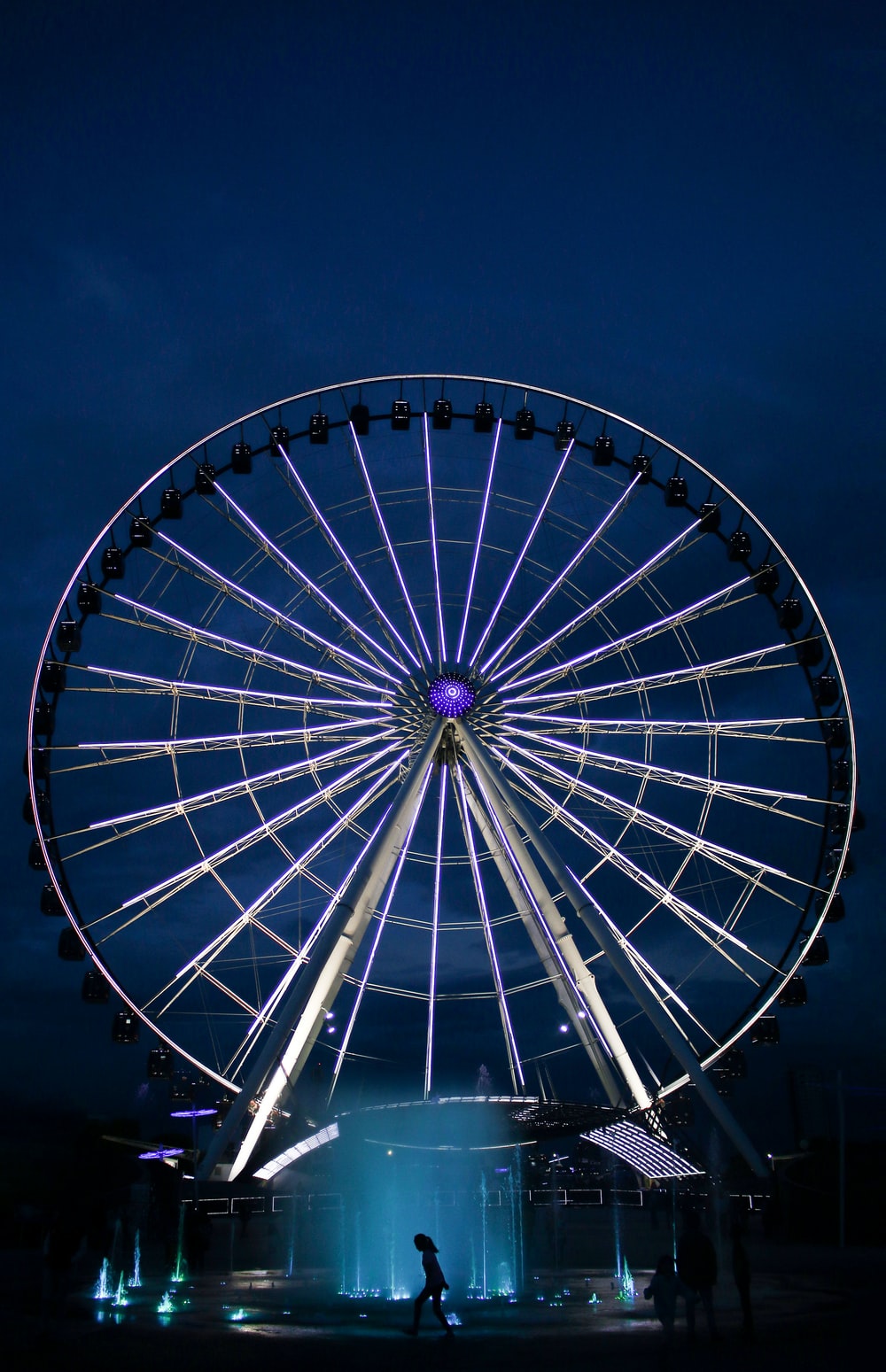 silver ferris wheel during nighttime photo