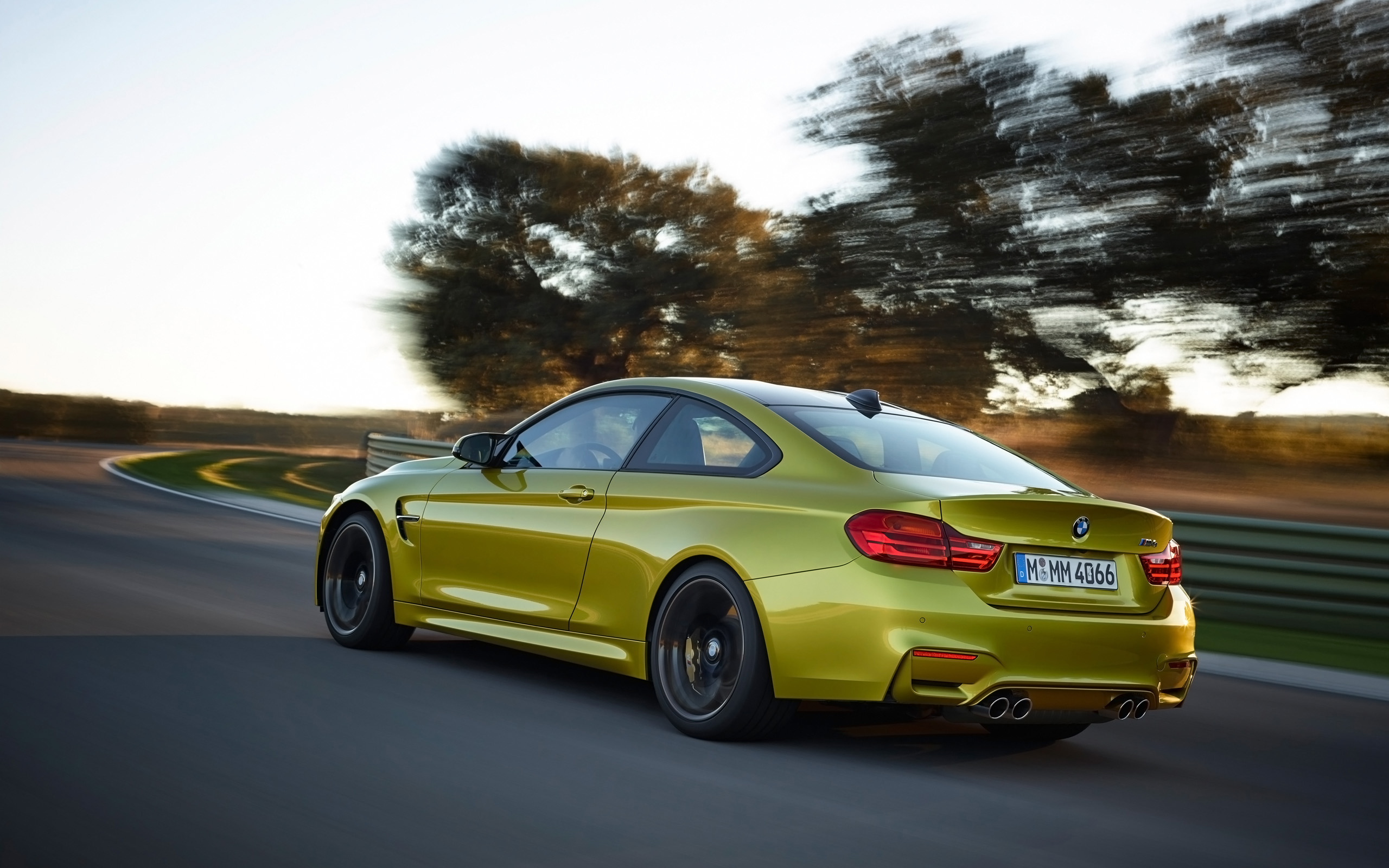 BMW M4 Coupe Motion Side Angle wallpaper BMW M4 Coupe Motion Side Angle