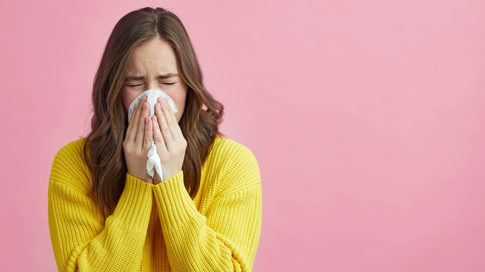 Why is it bad to hold in a sneeze