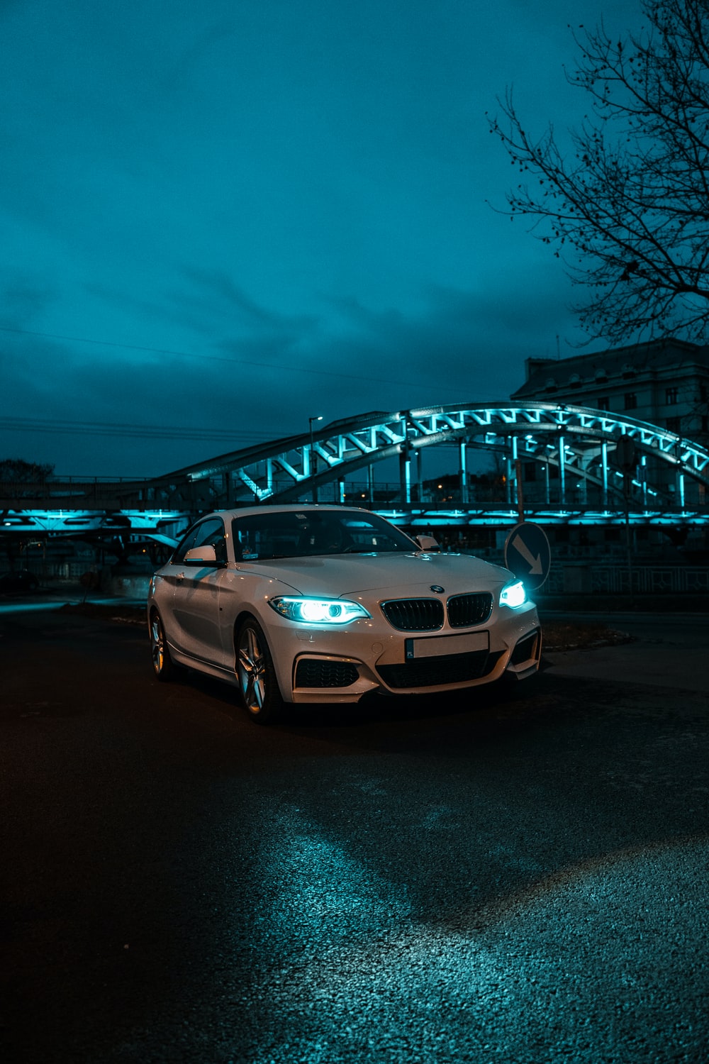 white bmw m 3 on road during night time photo
