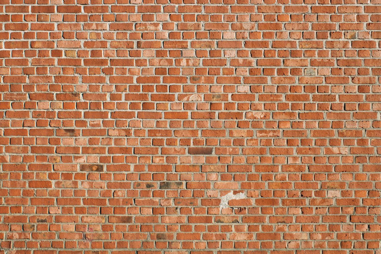 Faux Brick Textured Wallpaper | Wayfair