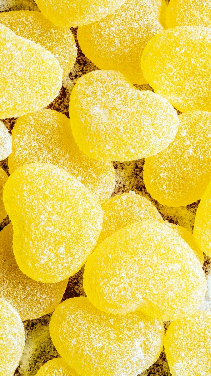 Yellow chewy candies. premium image / Karolina / Kaboompics. Yellow aesthetic, Yellow wallpaper, Yellow aesthetic pastel