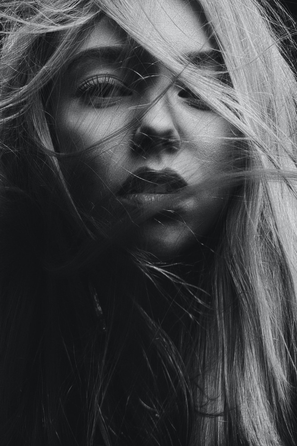 grayscale photography of woman's face photo