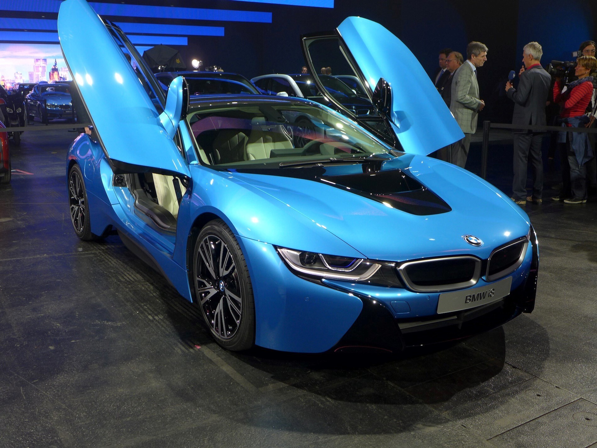 Protonic Blue BMW i8 Luxury Two Seater Car with Open Door Wallpaper