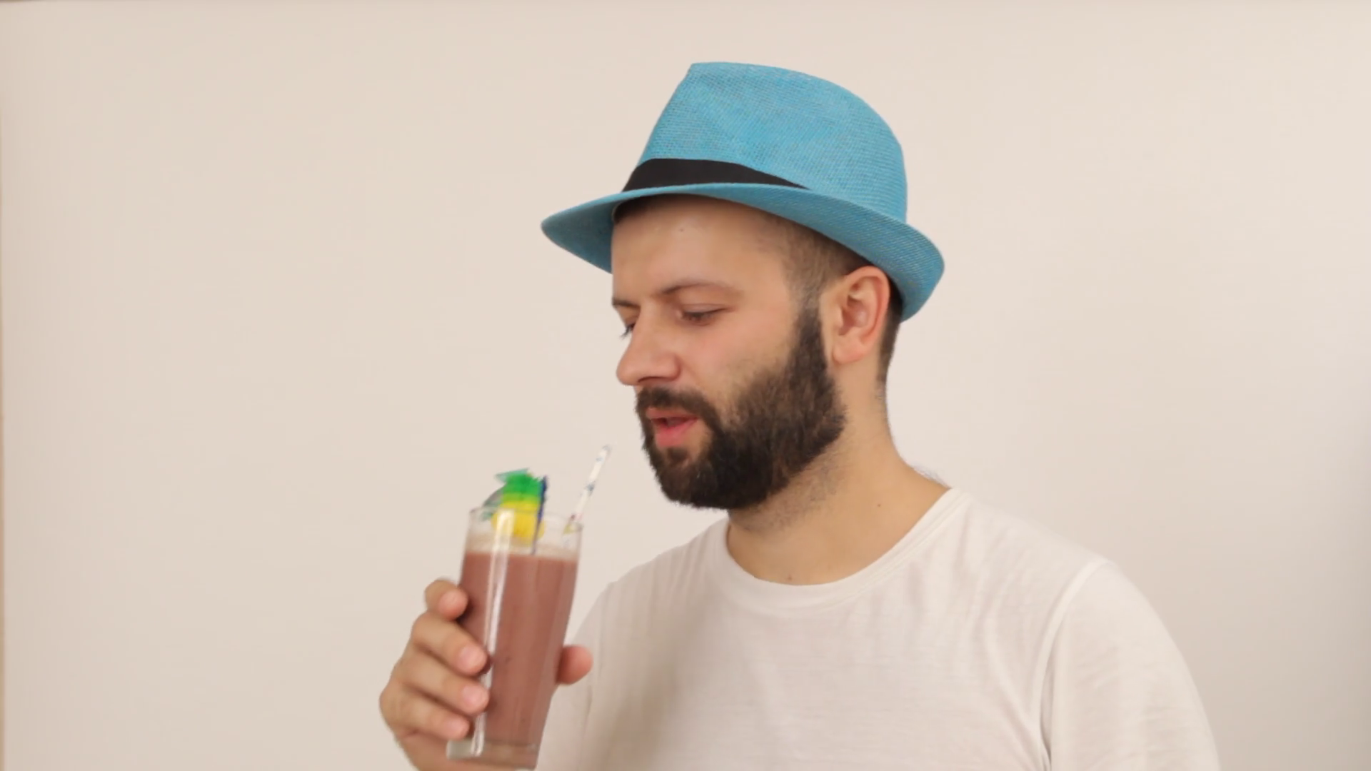 Man drinking smoothie cocktail juice Stock Video Footage