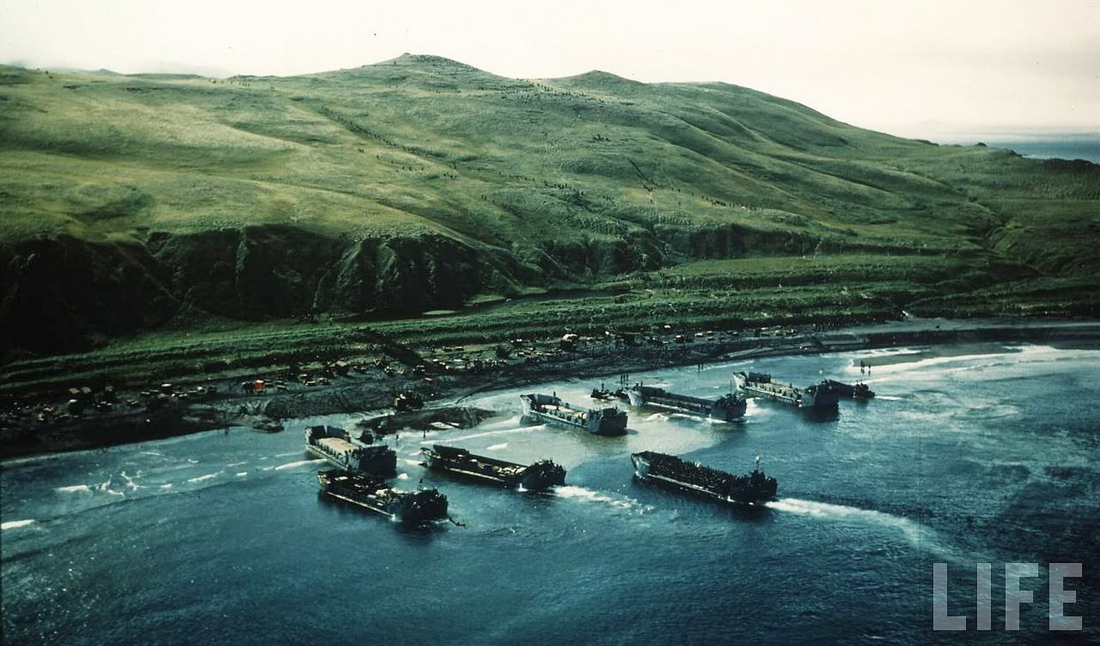 Kiska Island, Aleutians 1943 (note files of troops making their way up hills). Aleutian islands, Kiska, Wwii