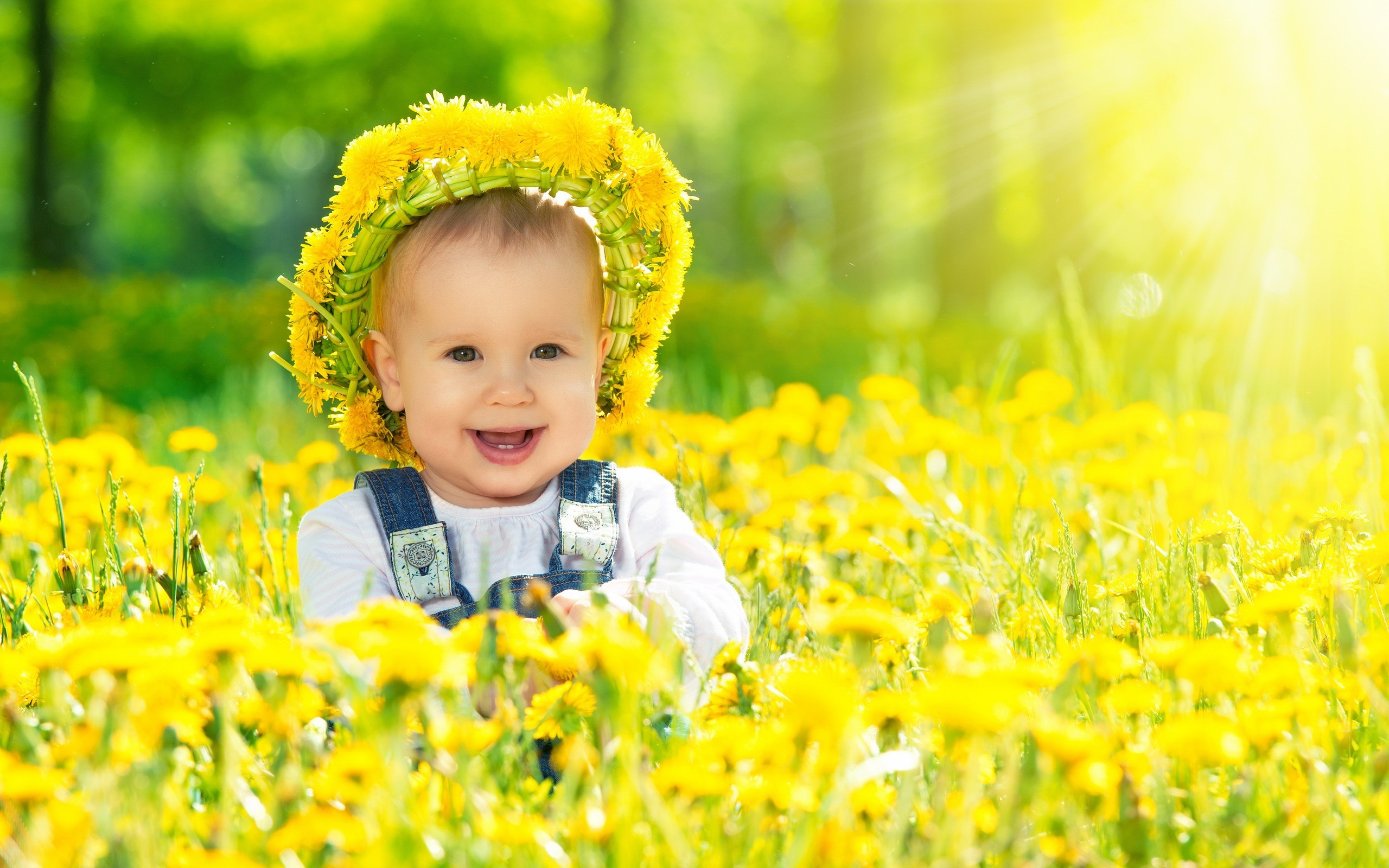 Happy Baby Girl With Yellow Flowers Wallpaper