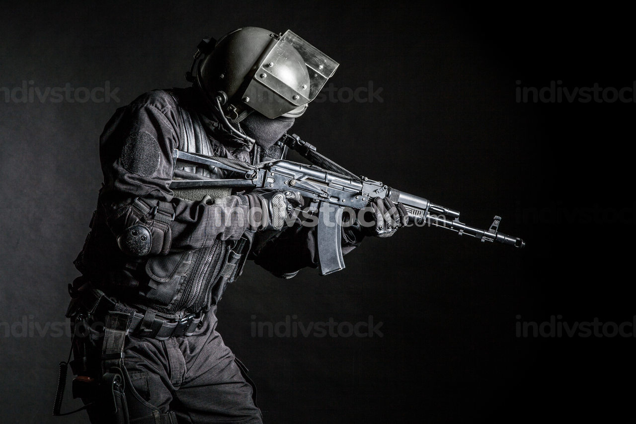 Russian special forces operator in black uniform and bulletproof helmet & Textures