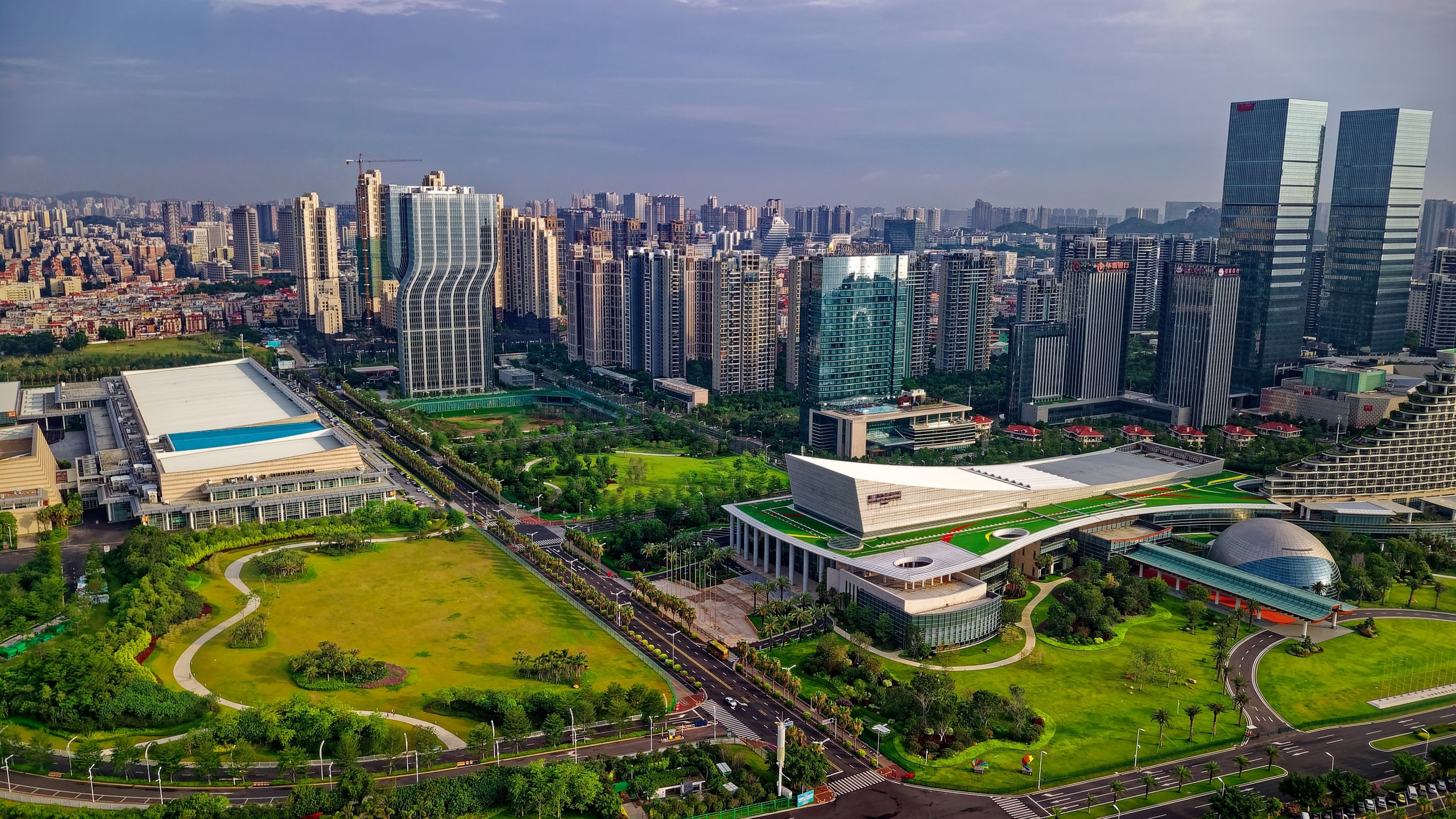 Download 2560x1440 China Xiamen, Skyscrapers, Stadium, Green, Modern Architecture, Drone View Wallpaper for iMac 27 inch