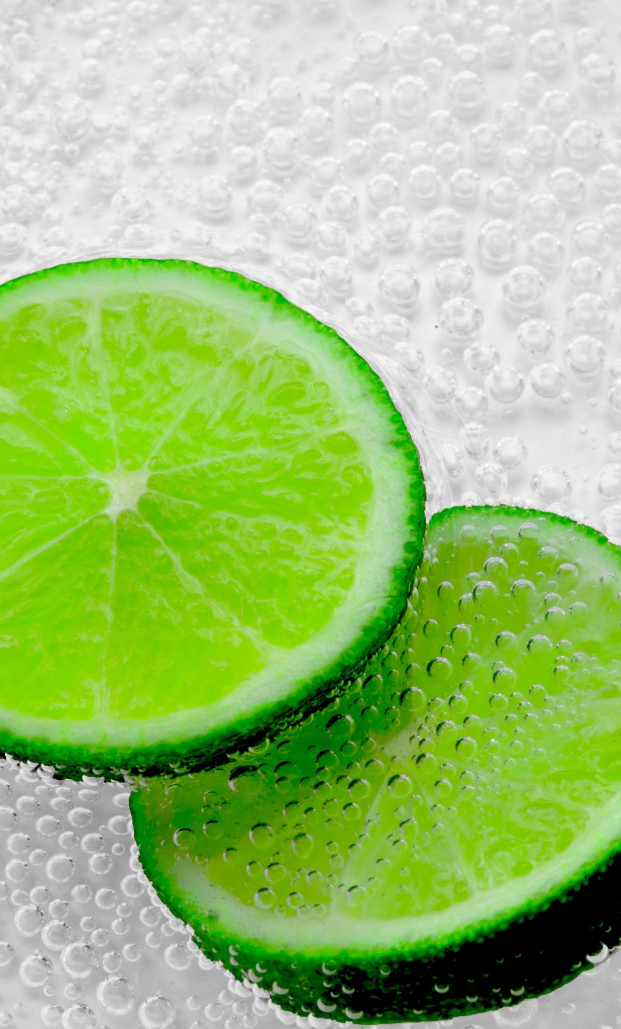 Download green lemon slices, bubbles, close up 1280x2120 wallpaper, iphone 6 plus, 1280x2120 HD image, background, 24949