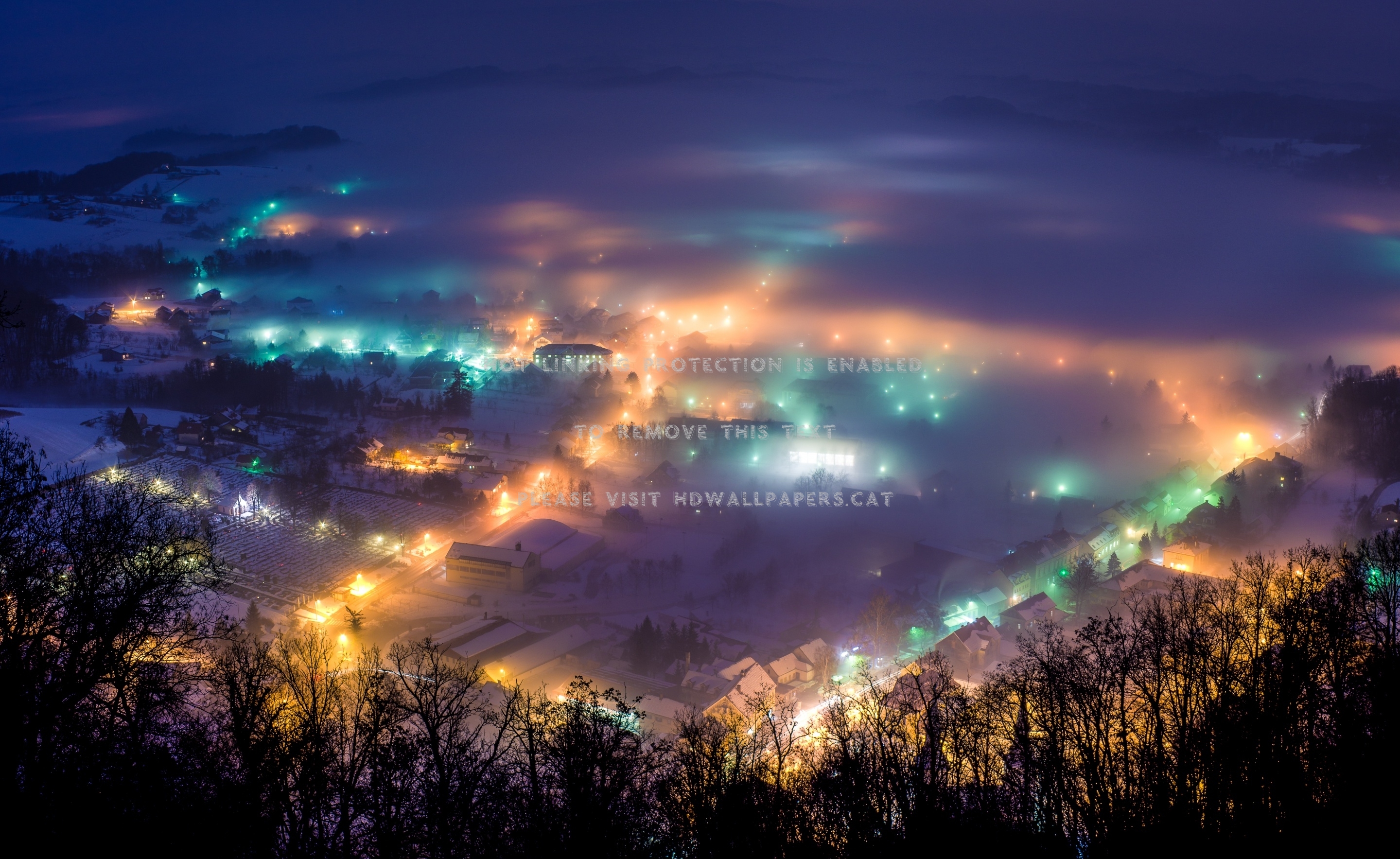 winter night snow croatia lights town