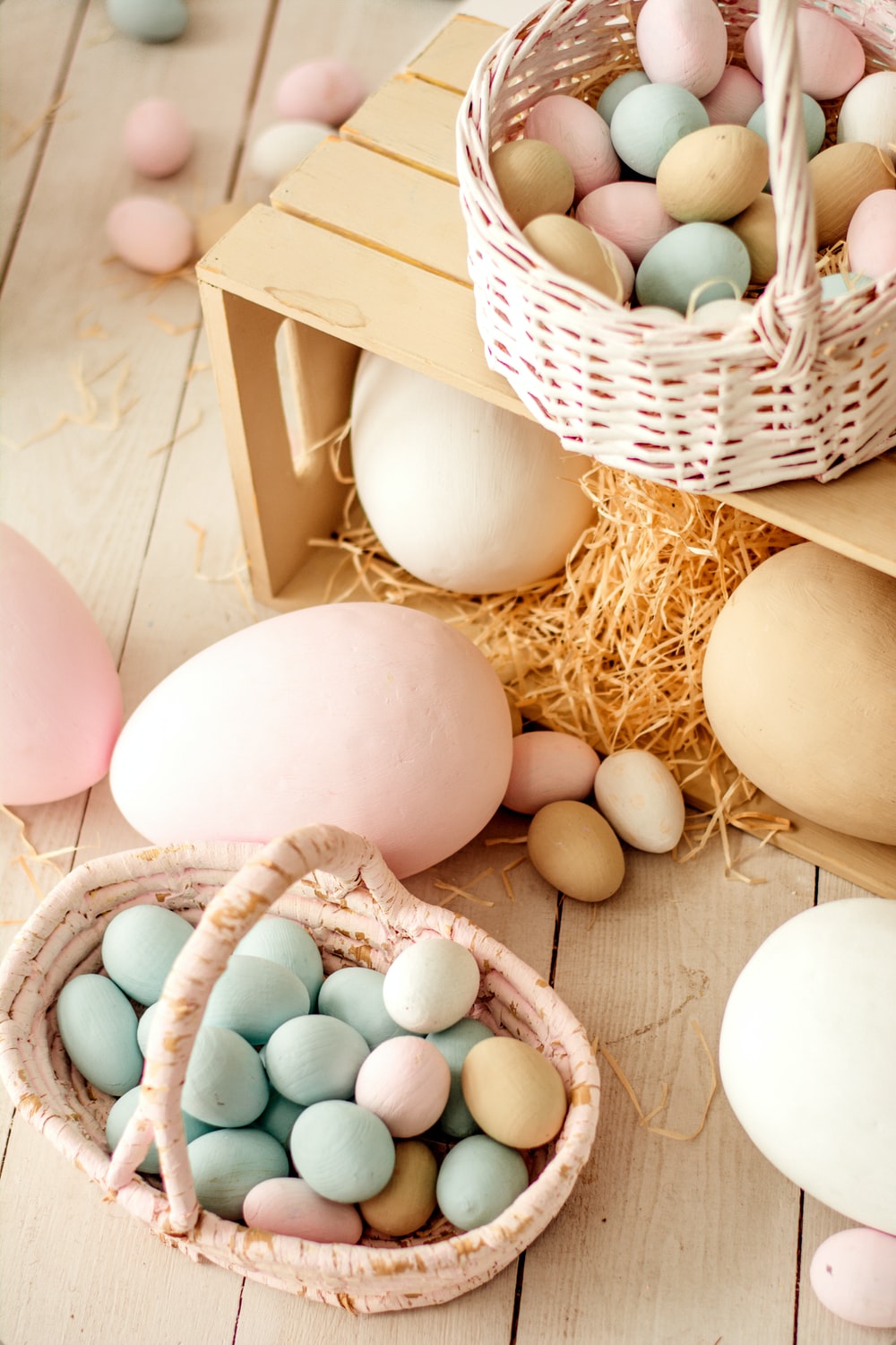 white eggs in brown woven basket photo