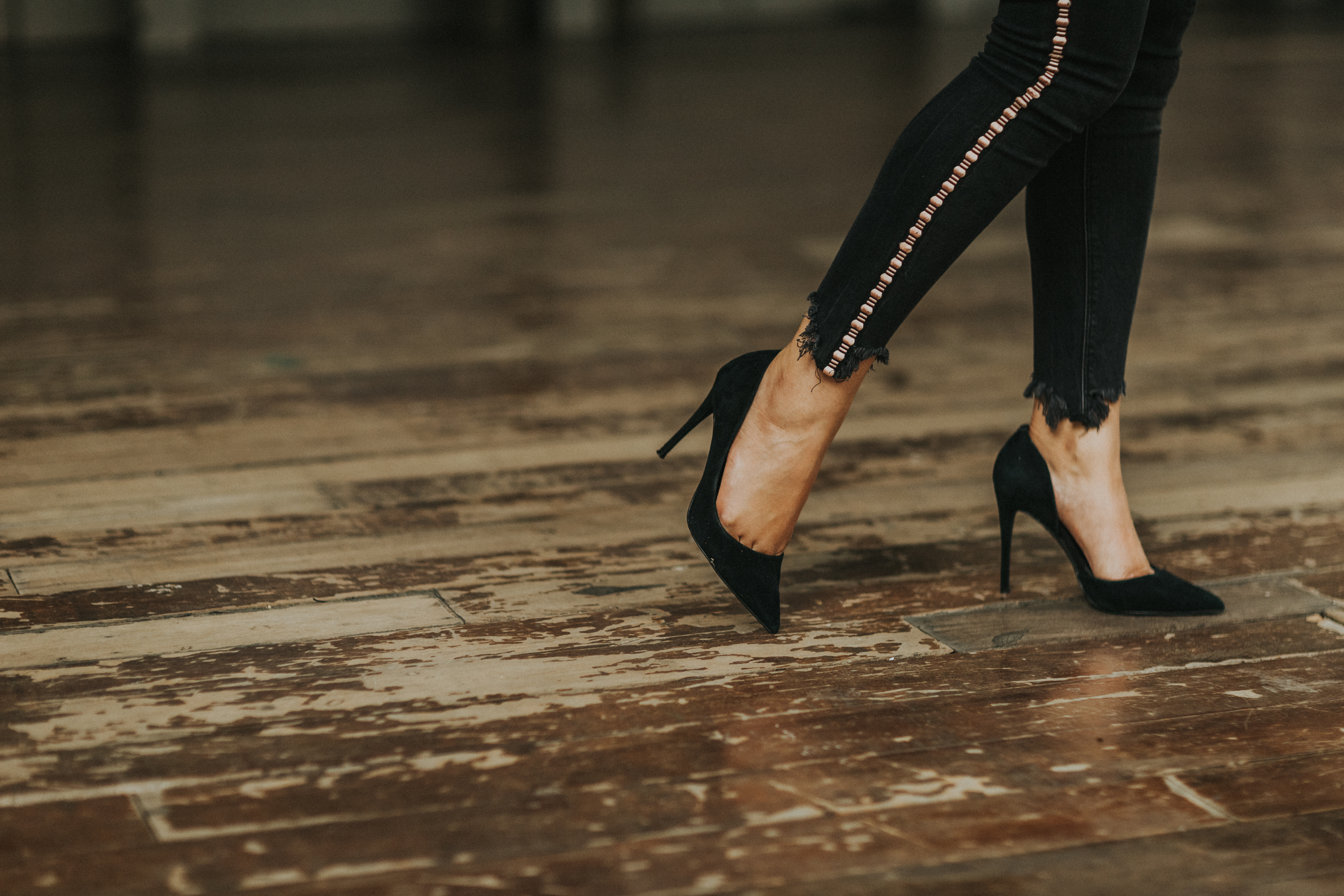 Woman Wearing Black Suede Stilettos · Free