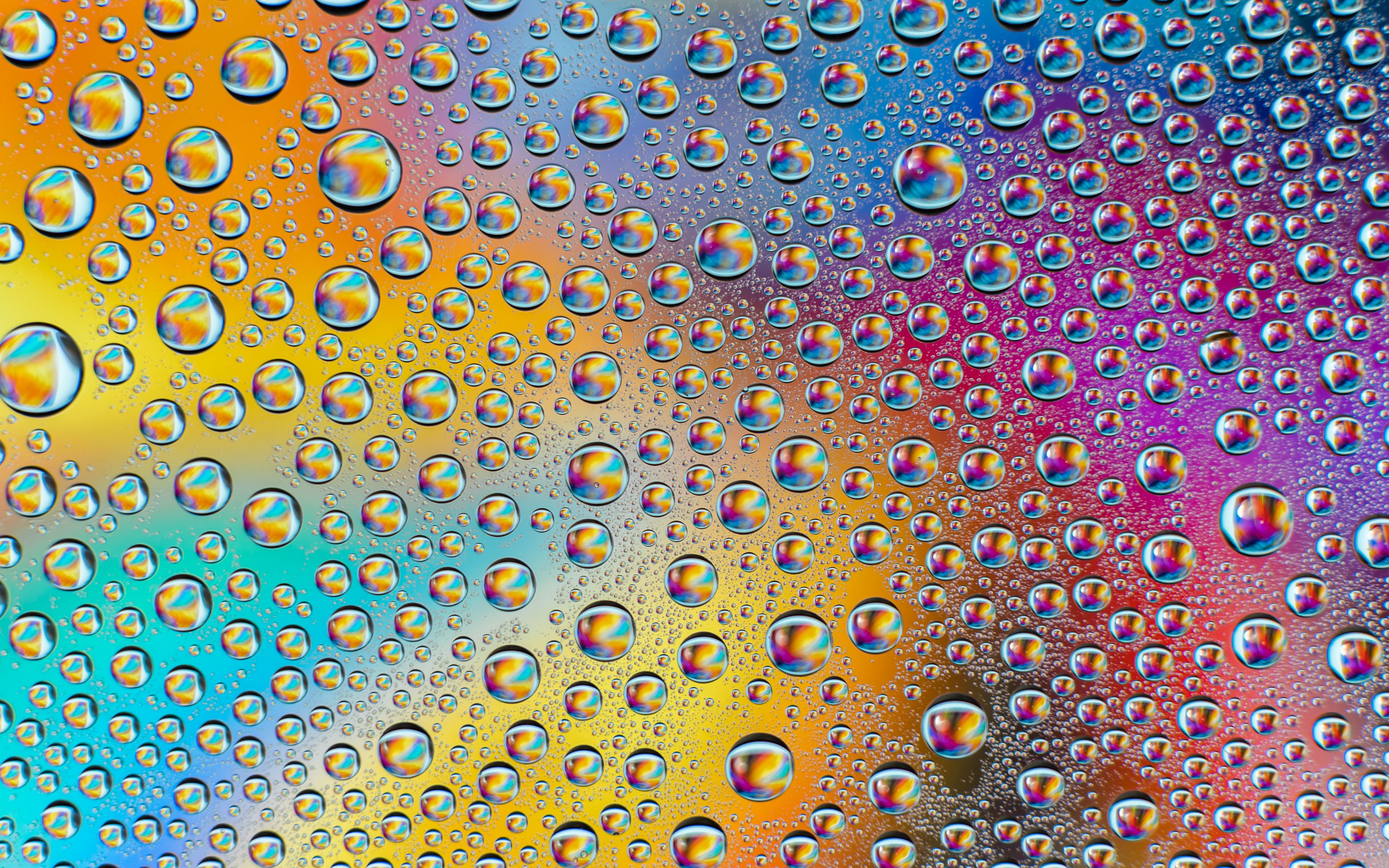 Drops with rainbow colors Wallpaper 4k Ultra HD
