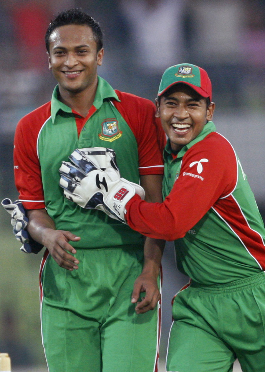 Shakib Al Hasan and Mushfiqur Rahim celebrate Andre Russell's dismissal. Photo. Bangladesh v West Indies
