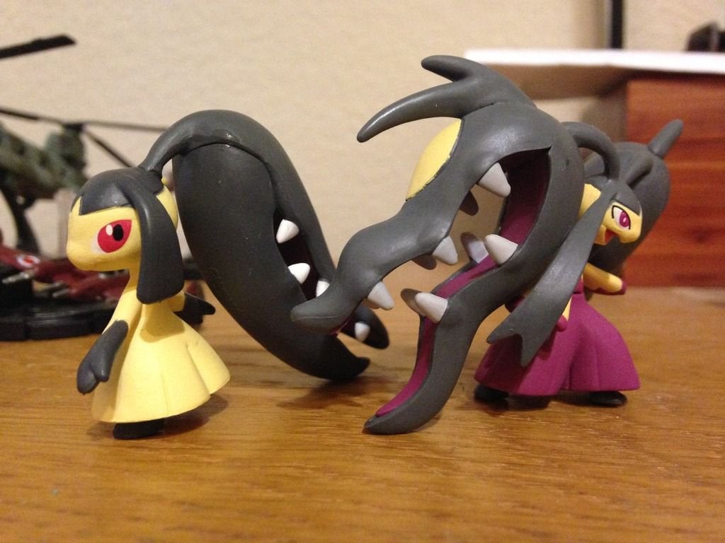 Back to back, Mawile and Mega Mawile